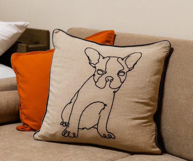 Decorative dog pillow close-up