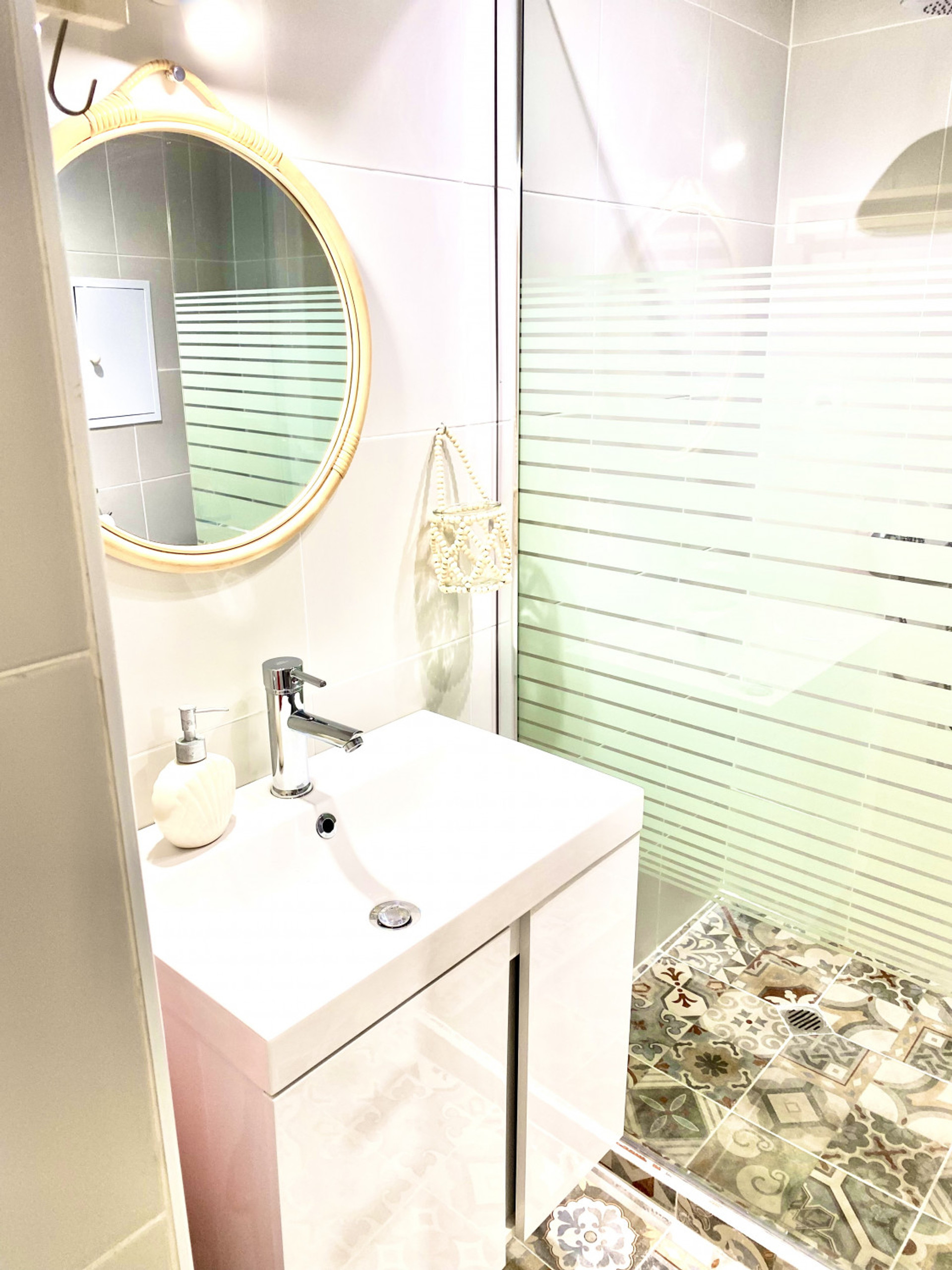 Bathroom with shower and mirror