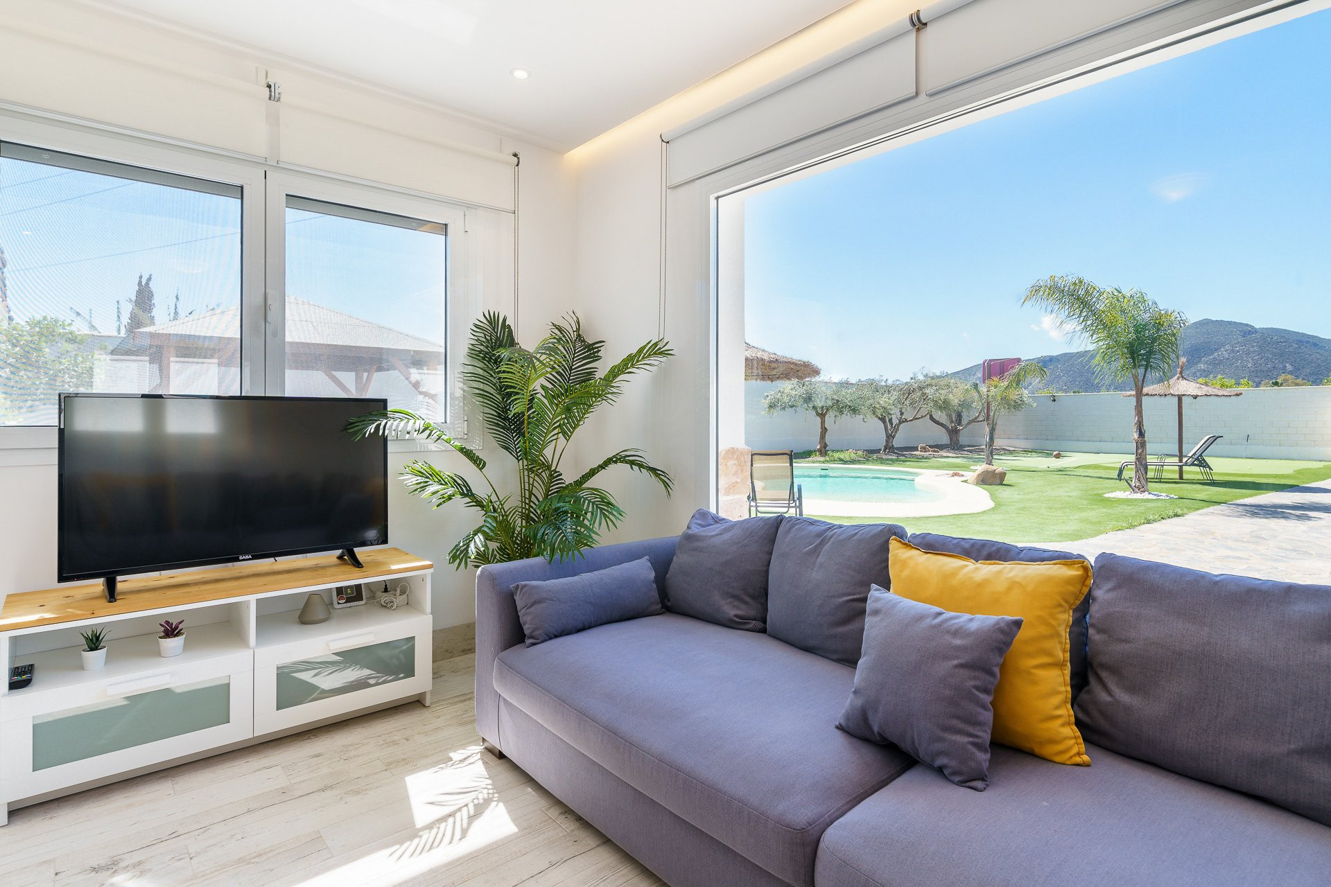 Living room with pool view