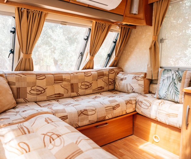 Cushioned corner seating by windows
