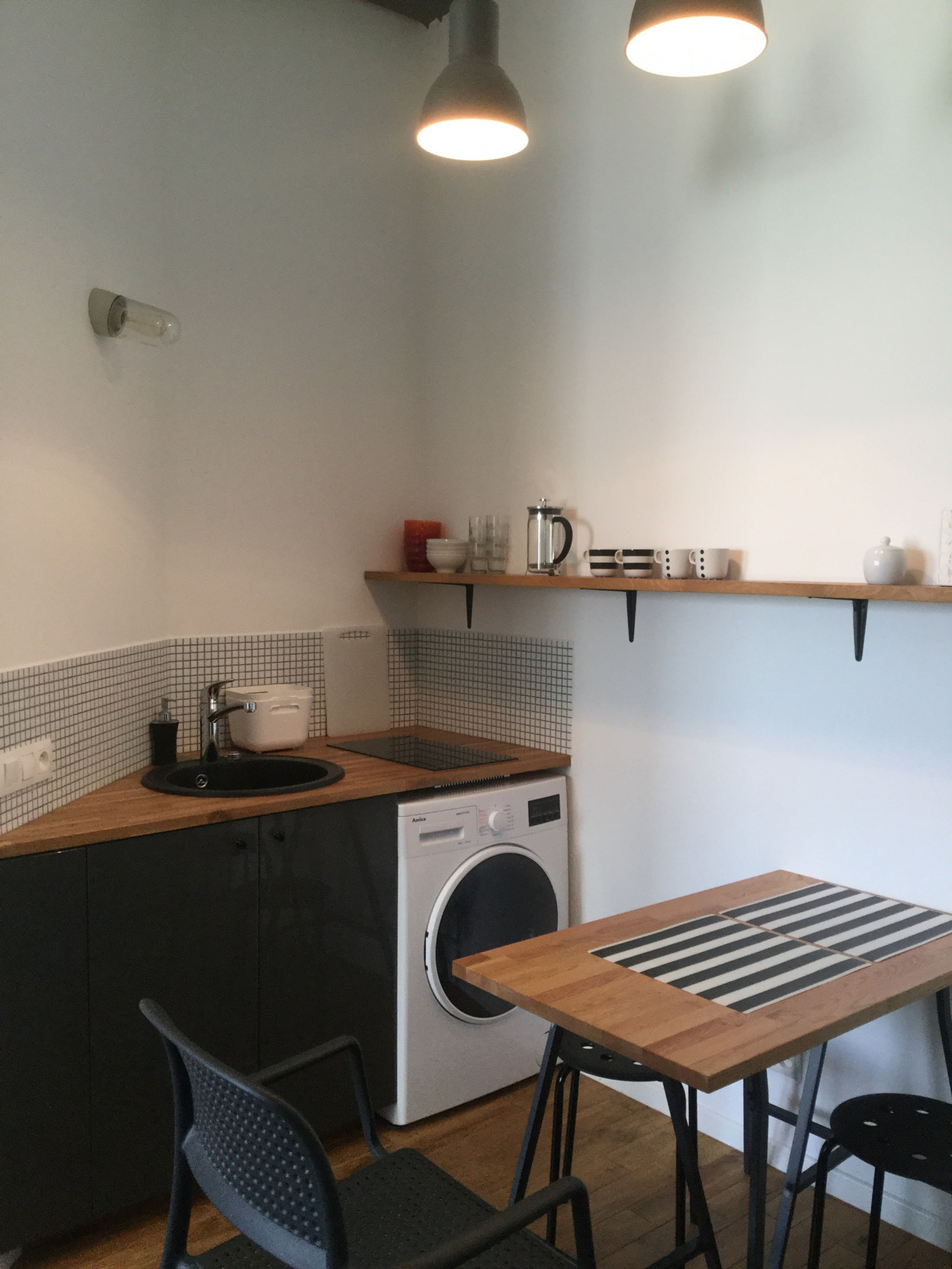 Kitchen with added washing machine/dryer