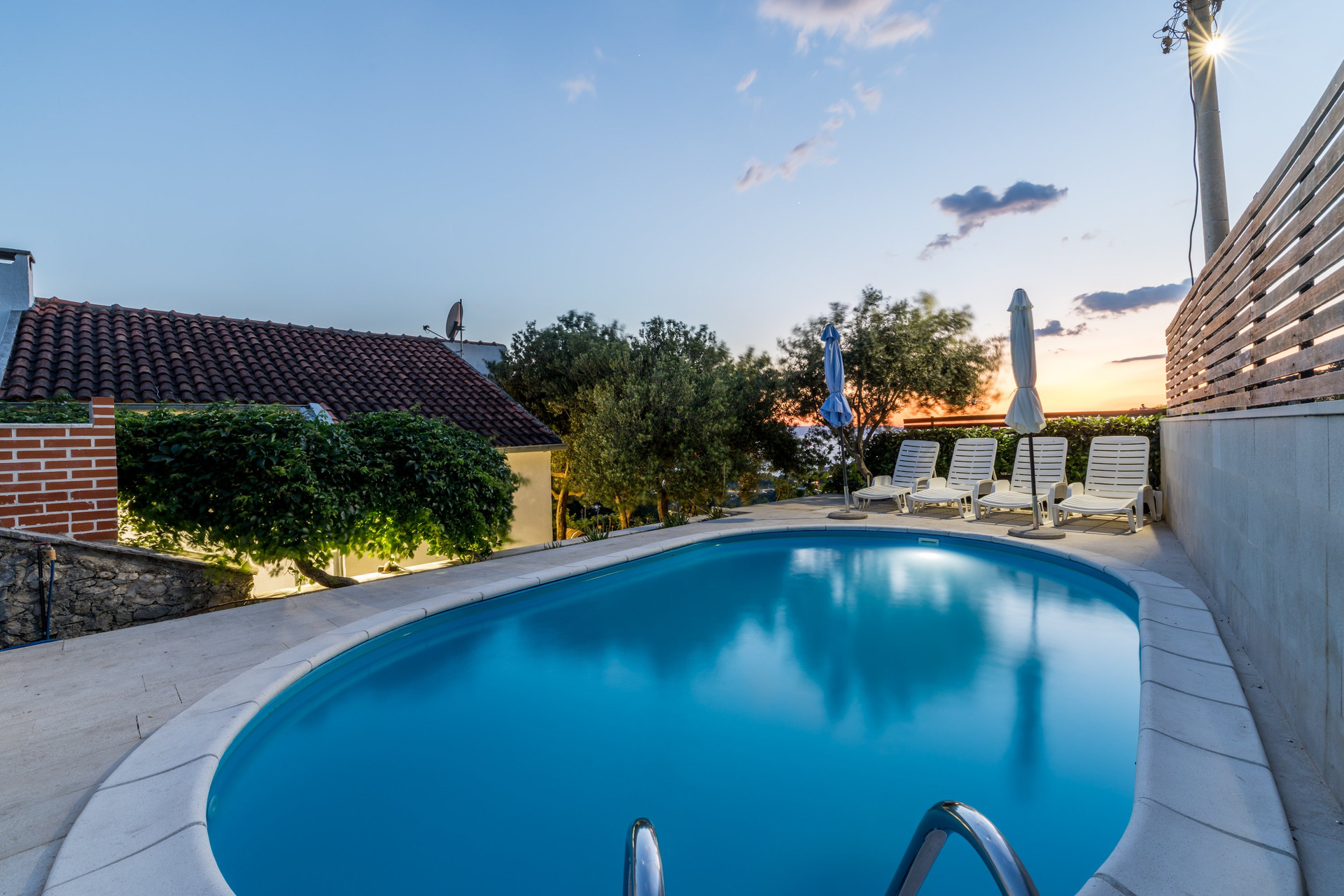 Pool area with a beautiful view, perfect for relaxing and enjoying the surroundings.
