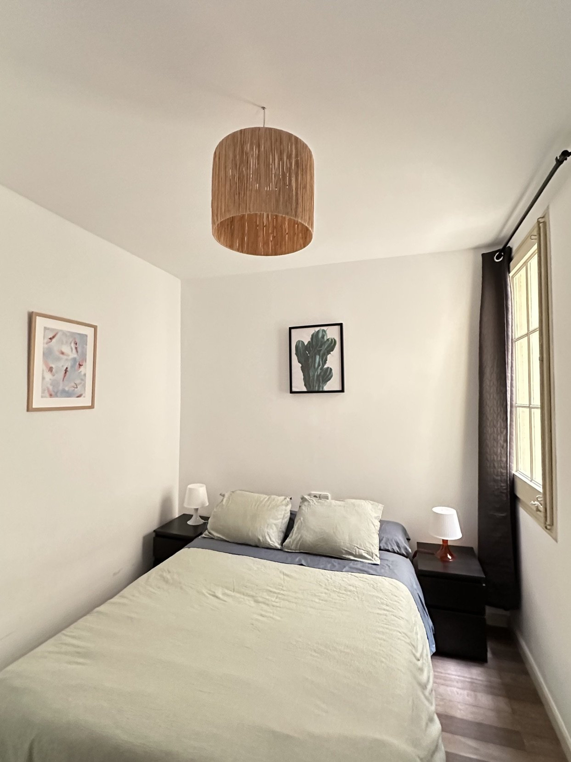 Double bedroom with rattan pendant light