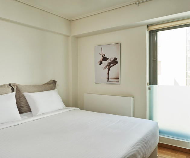 The bedroom with a king size bed