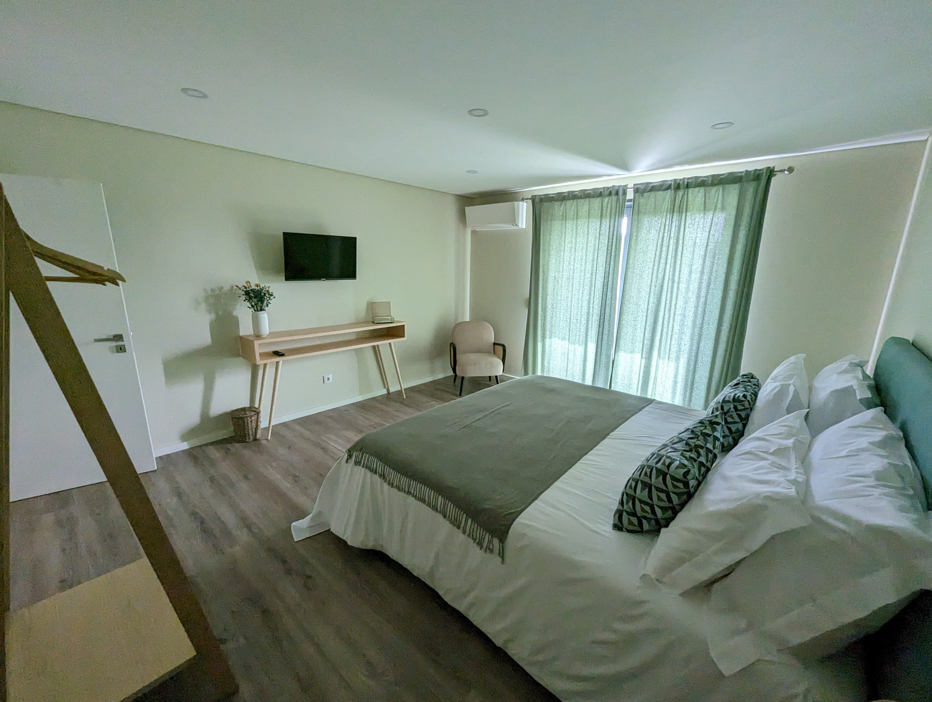 Wide view of bedroom