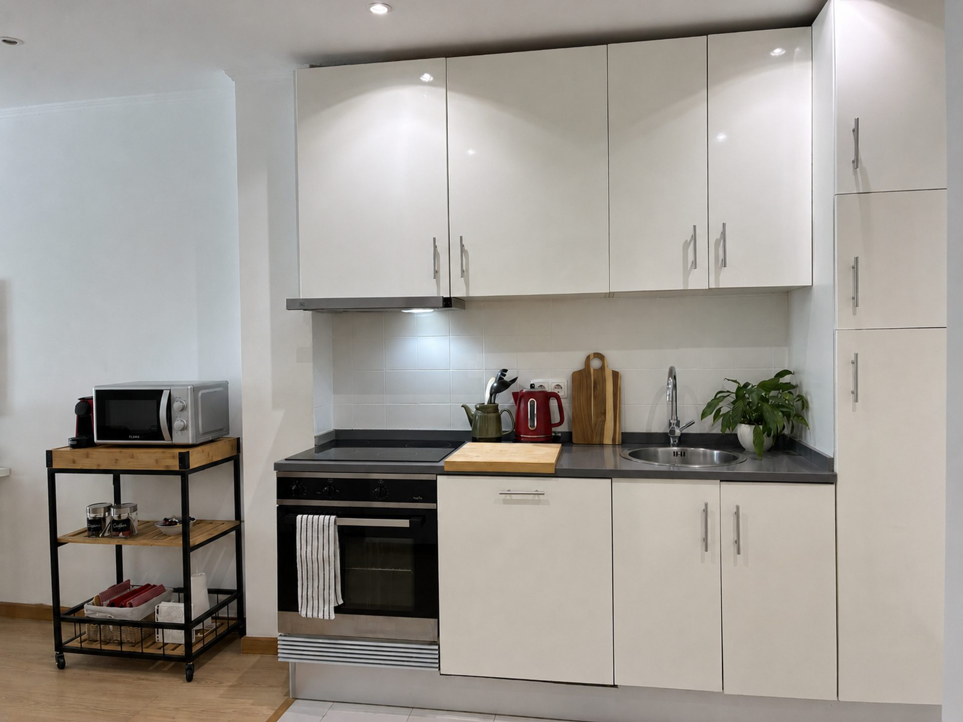 White kitchen with oven and appliances