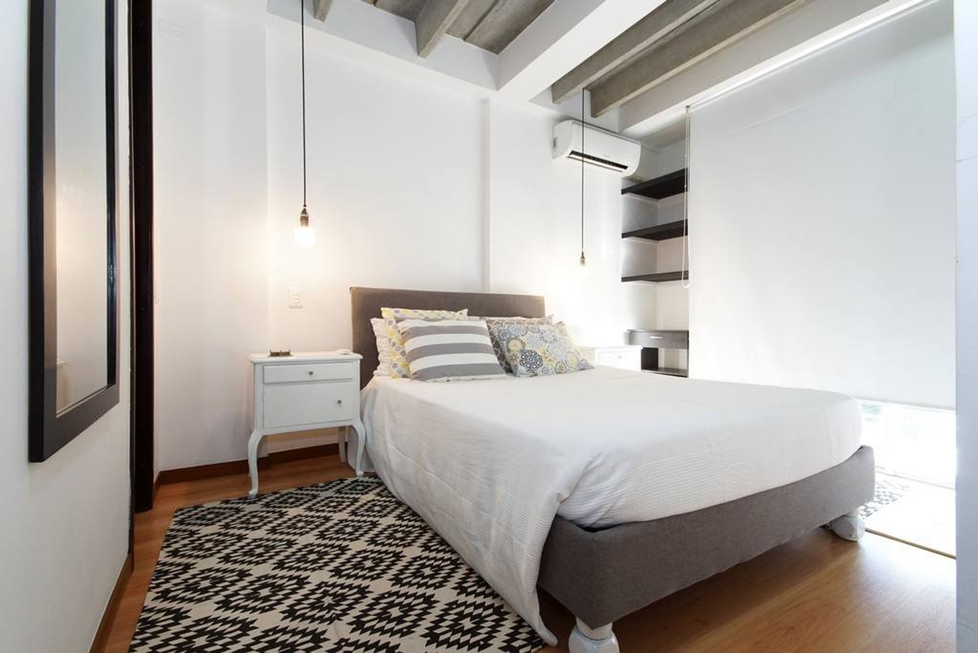 Bright bedroom with double bed