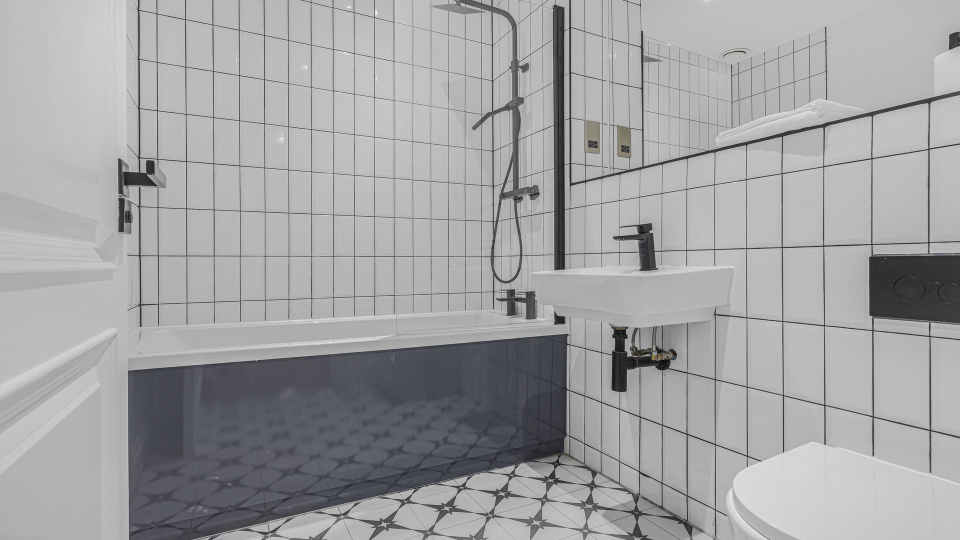 Bathroom bath shower white tiles
