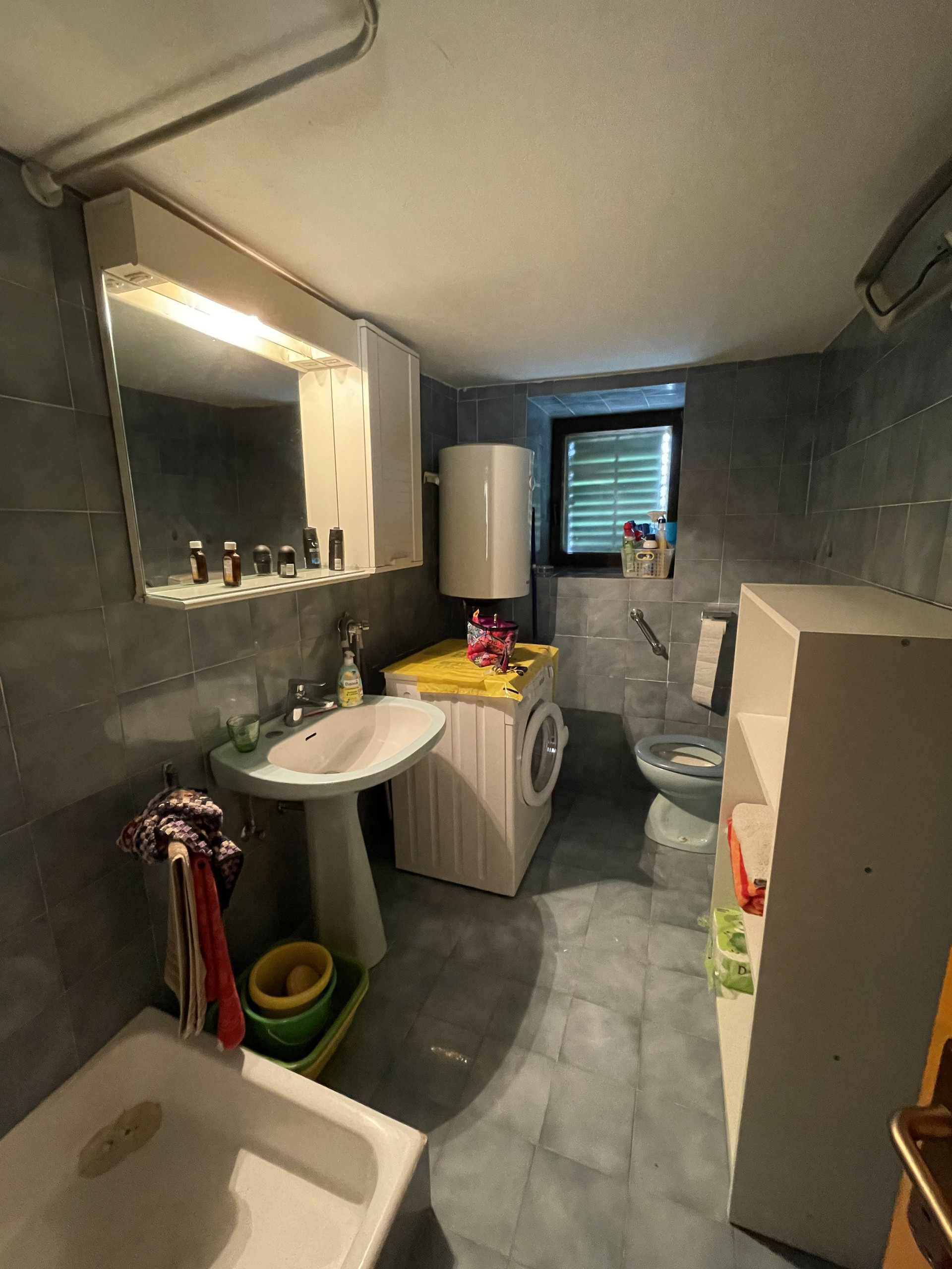 Bathroom with sink and toilet