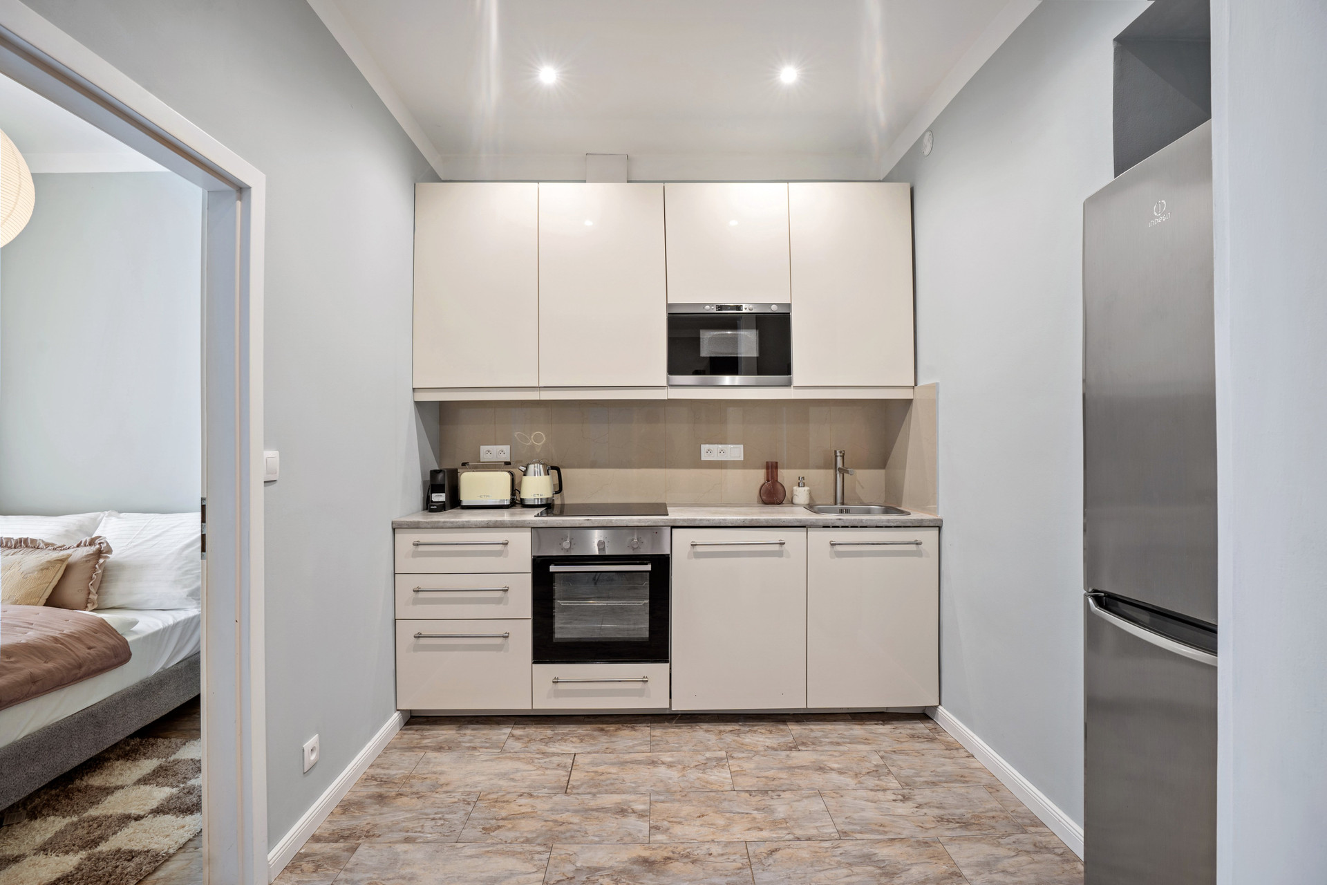 Modern white kitchen with oven