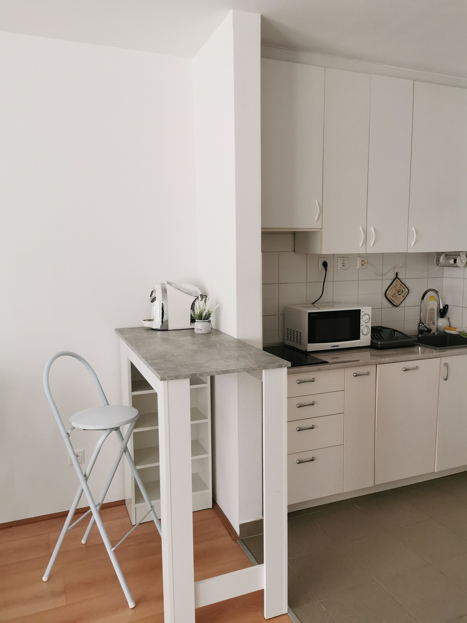 Kitchen counter with bar stool