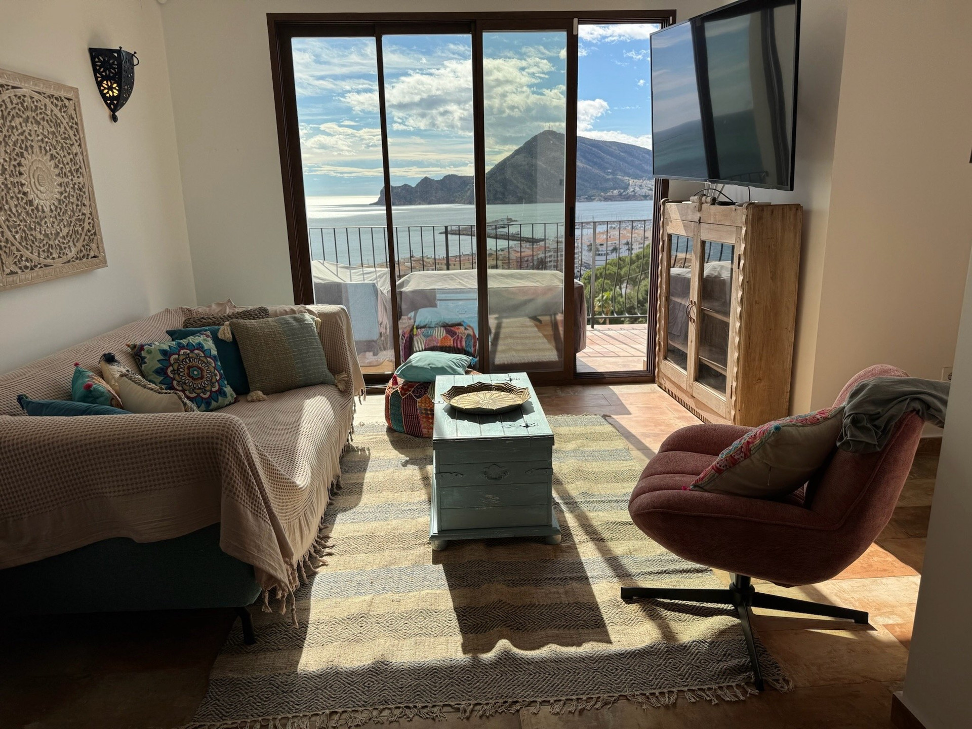Sunny living room with sea view