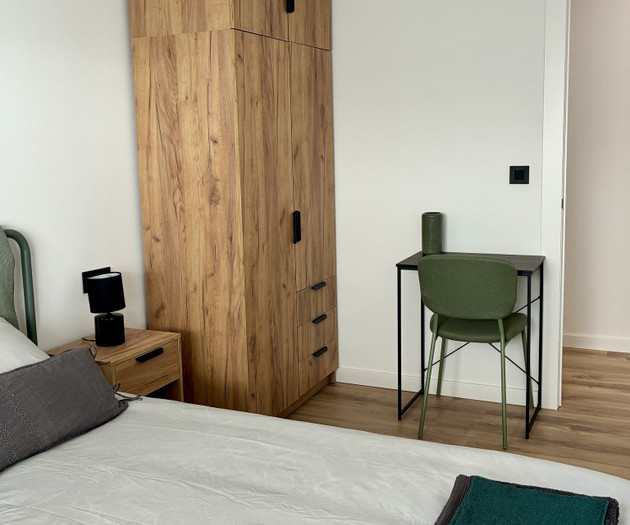Bedroom with wardrobe and desk