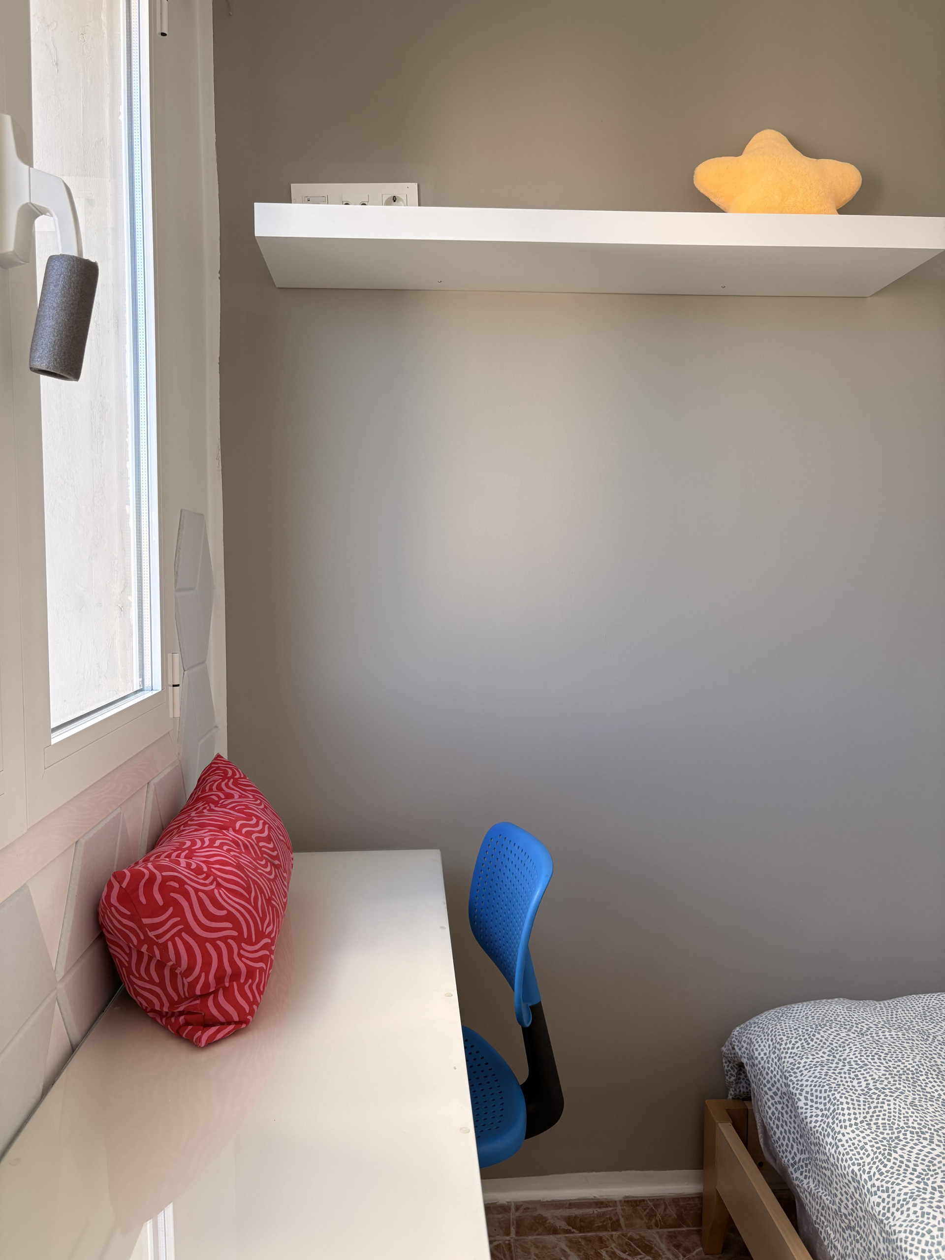 Bedroom corner with pillows