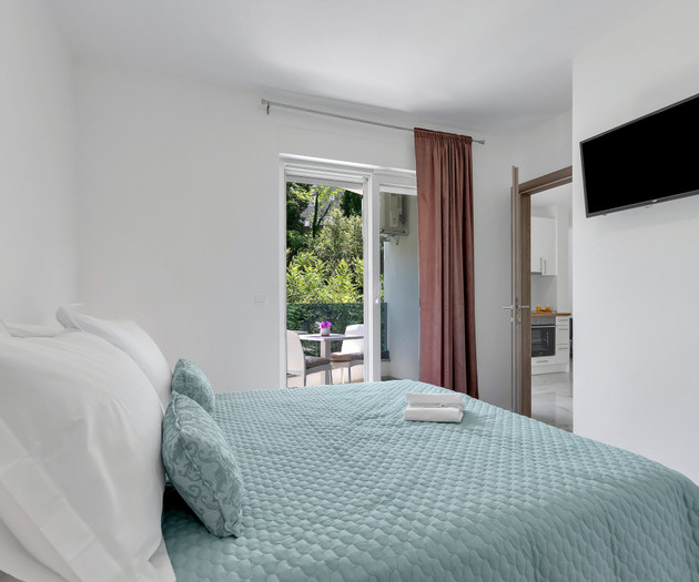 Bedroom with balcony access