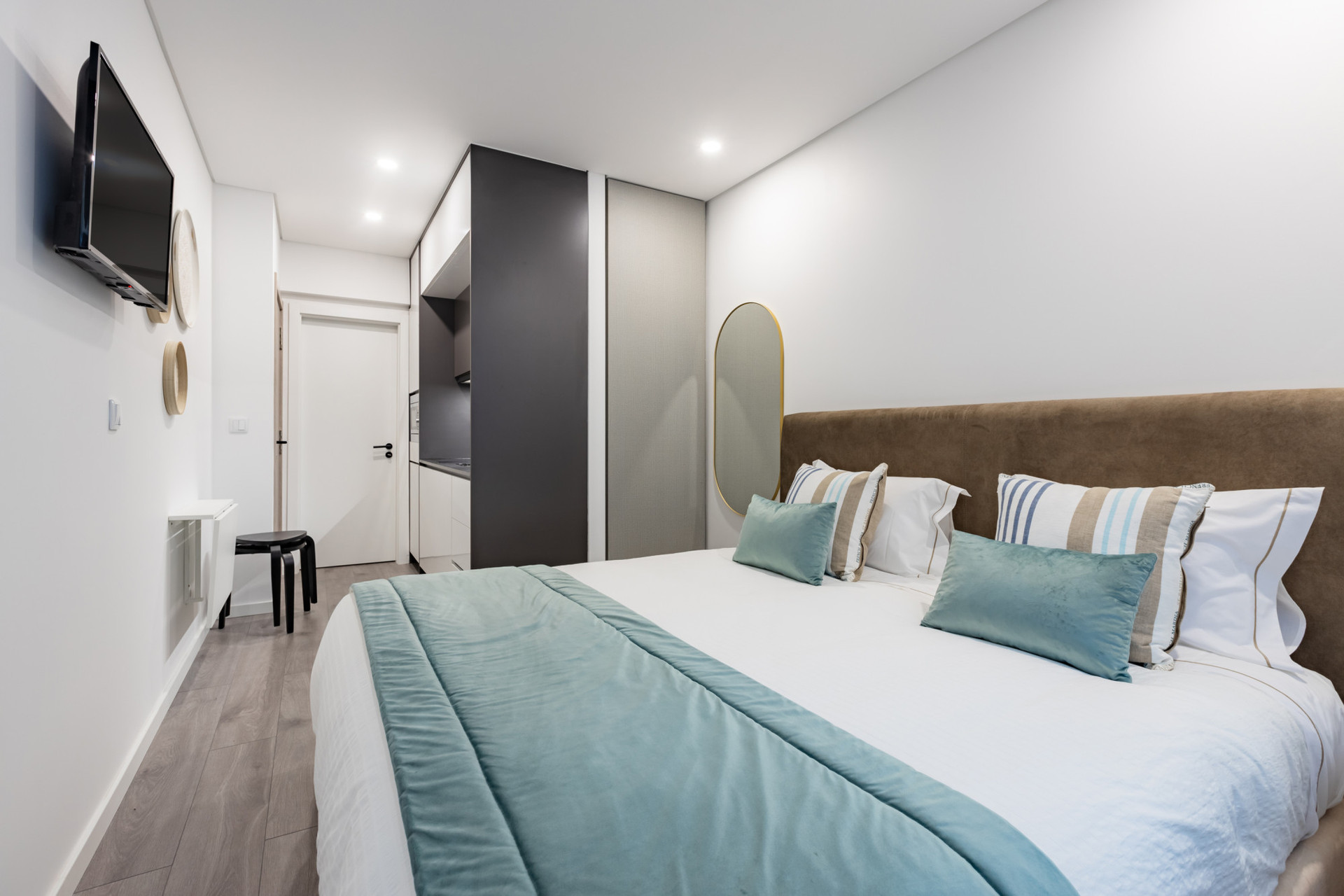 A comfortable double bed and TV.