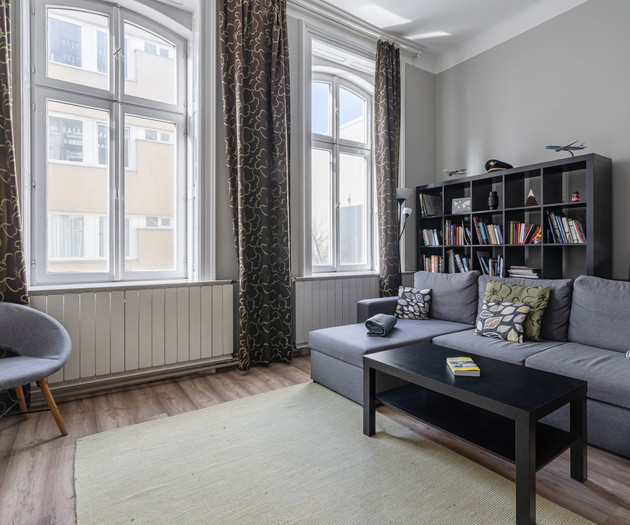 Bright living area with tall windows
