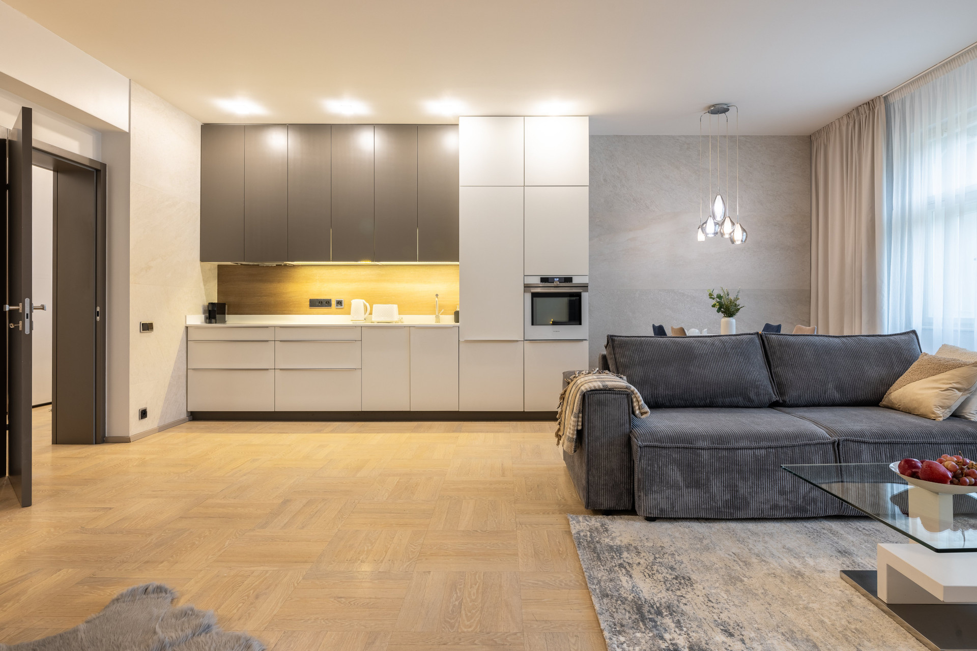 Kitchen with sofa foreground
