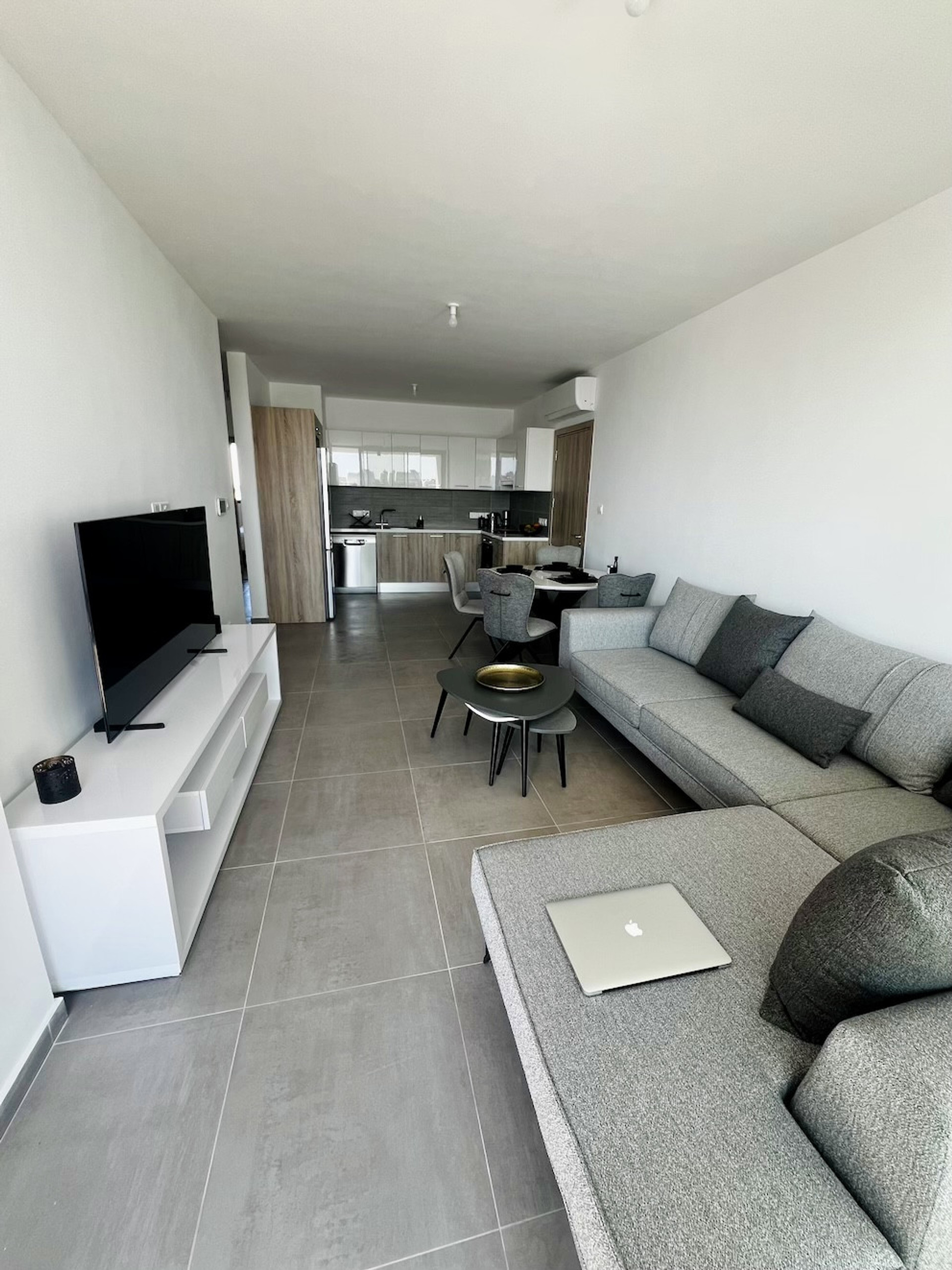 Loft-like Living Room feat. huge L Couch and 3 coffee table, AC