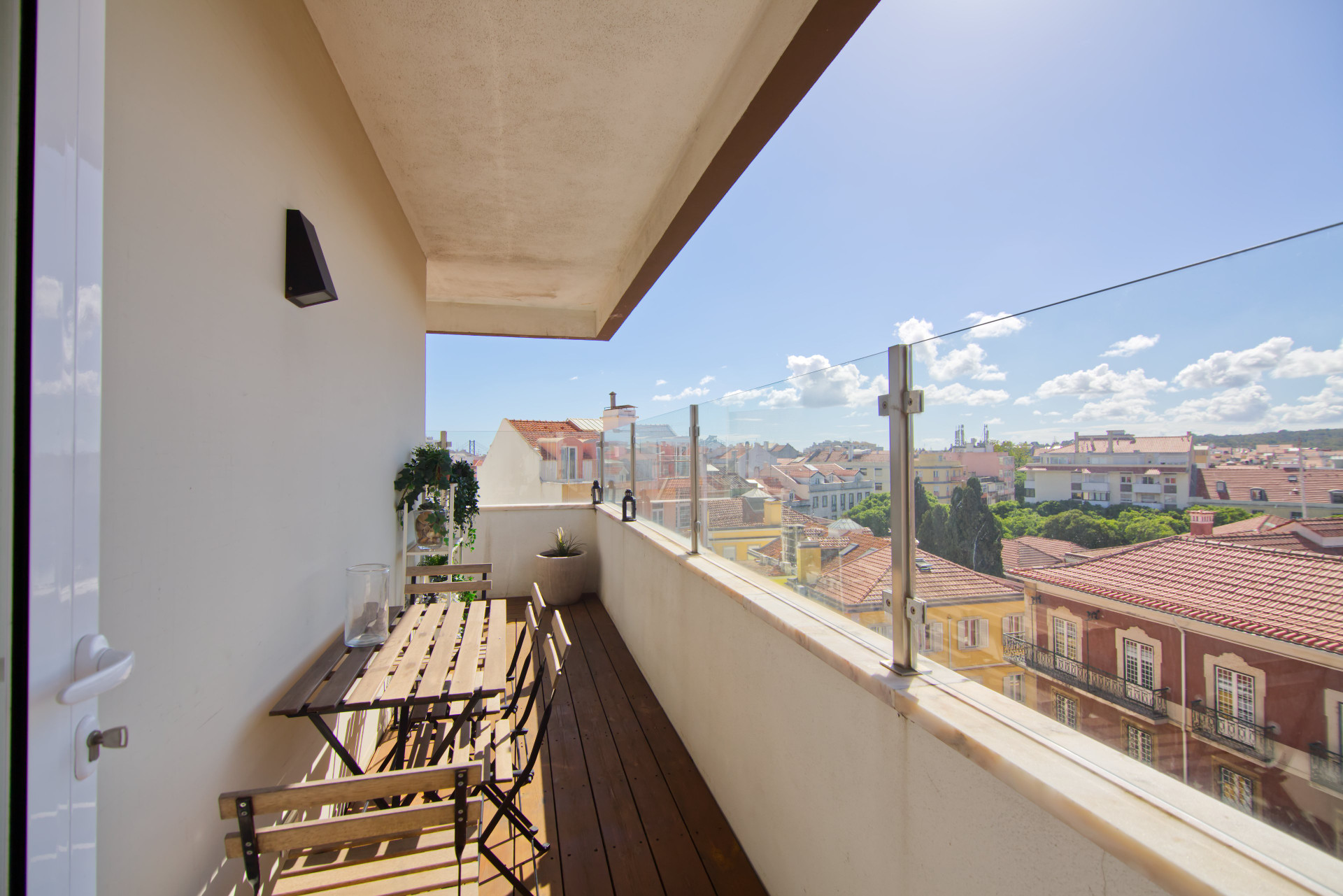 Balcony with city rooftop views