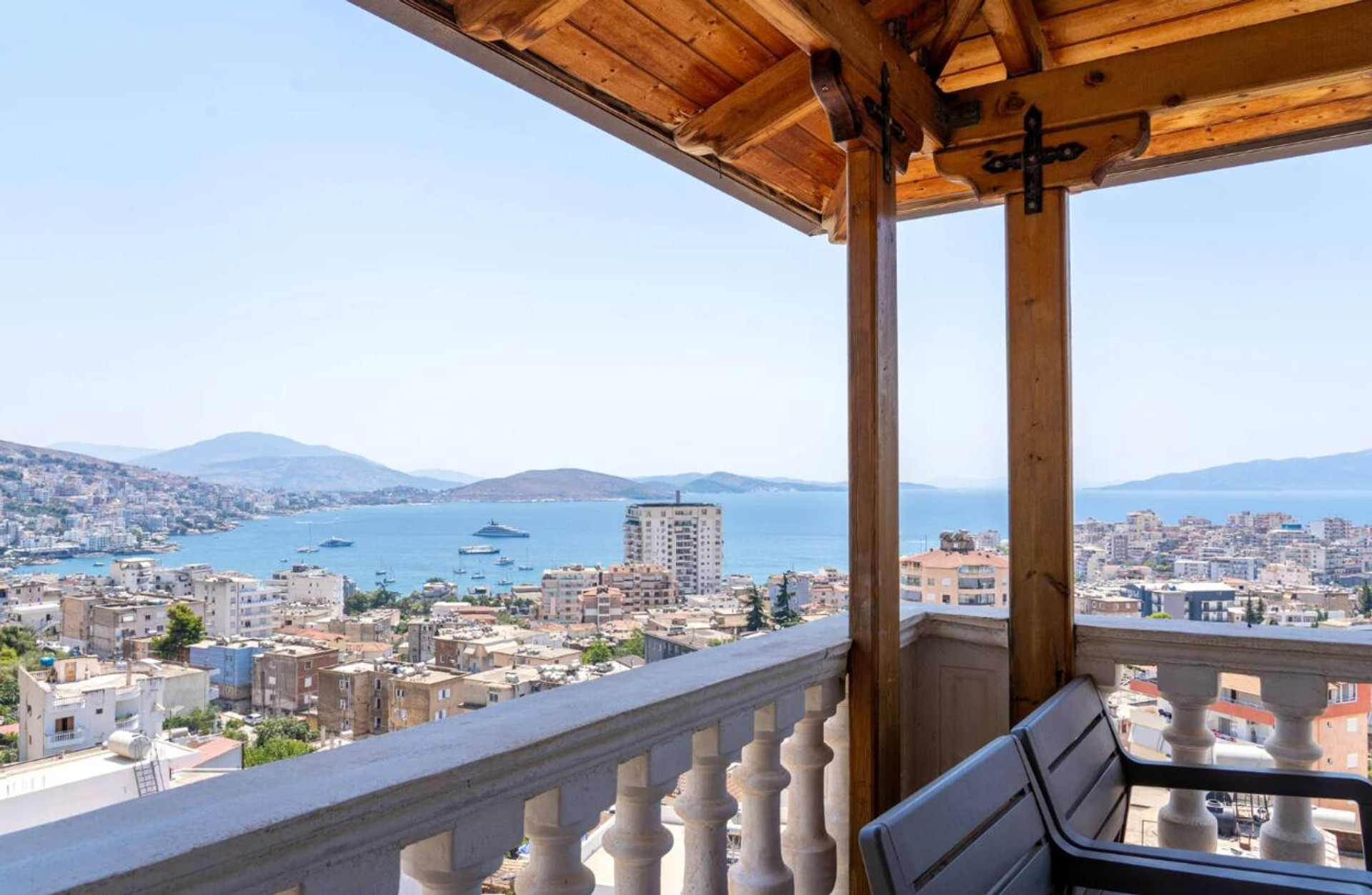 Balcony overlooking city and sea