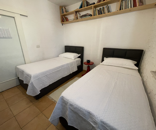 Twin bedroom with door
