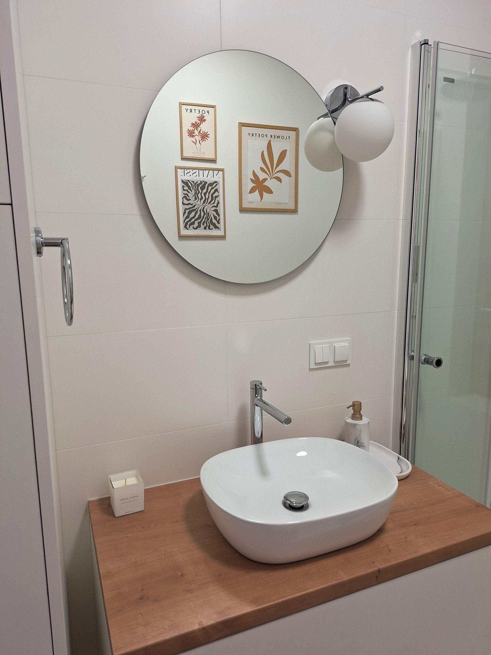 Bathroom vanity with round mirror