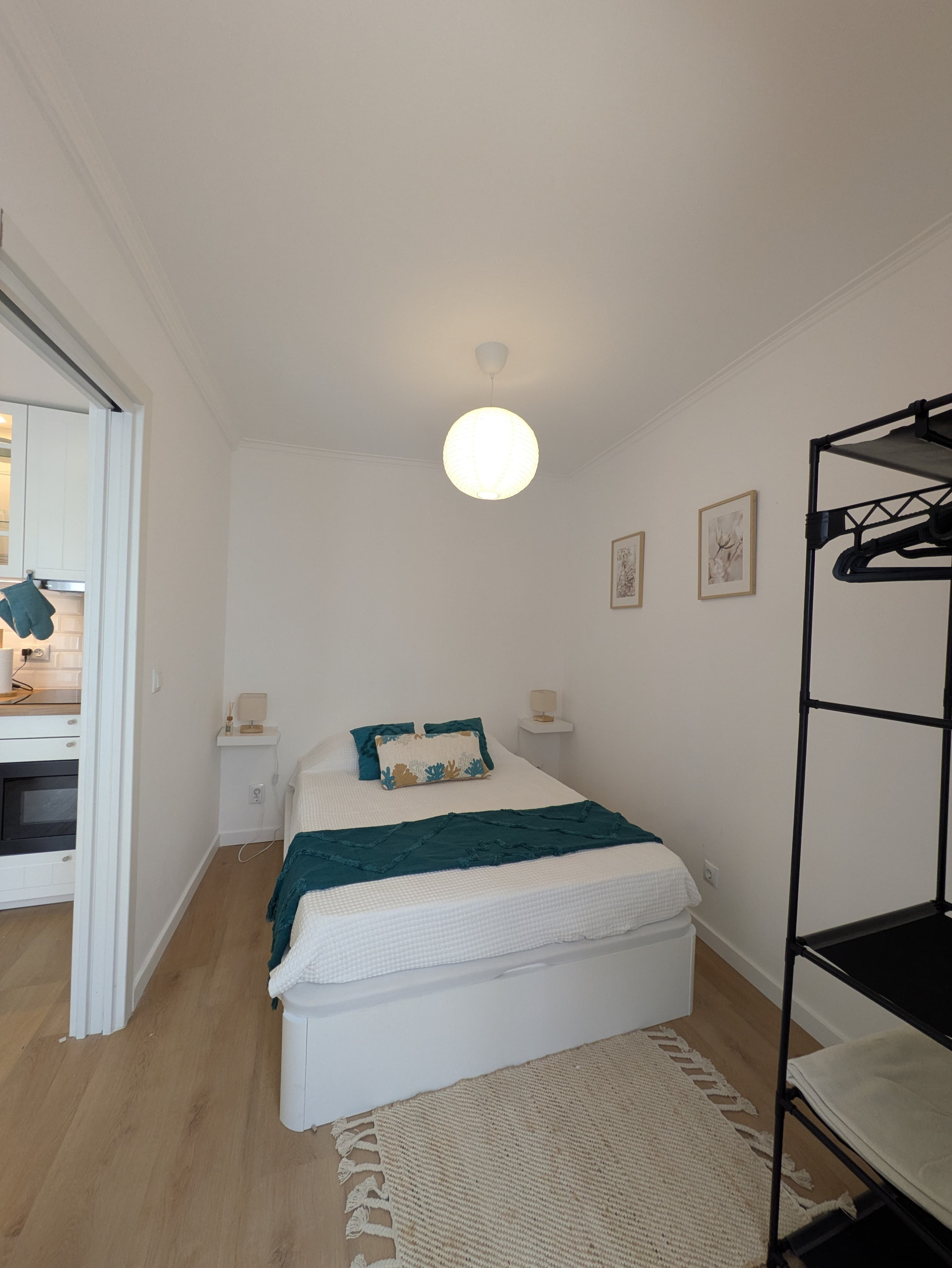 Bedroom with storage rack