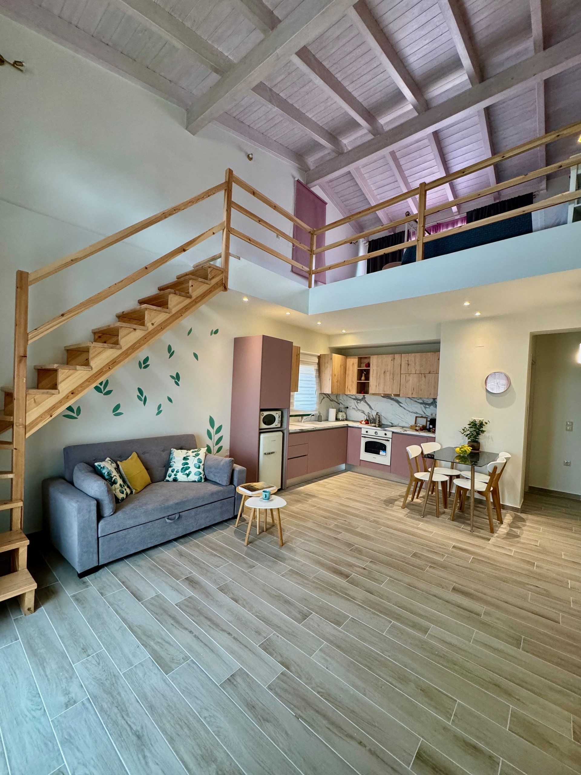 Open living room with loft stairs