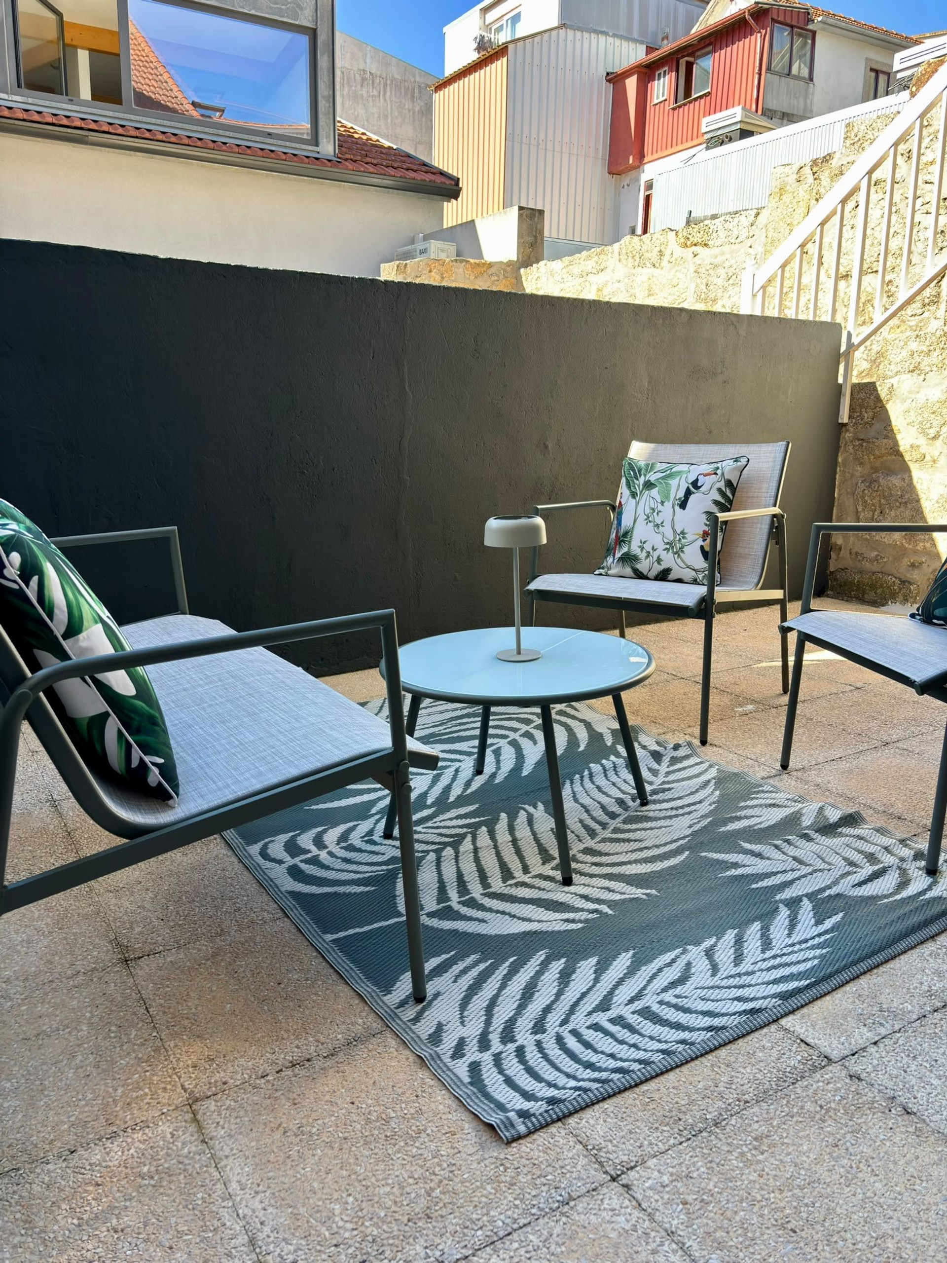 Sunny terrace with armchairs