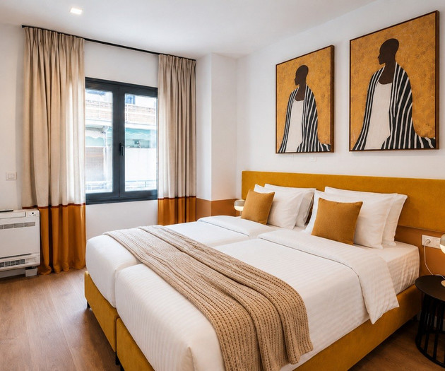 Twin beds with artwork above