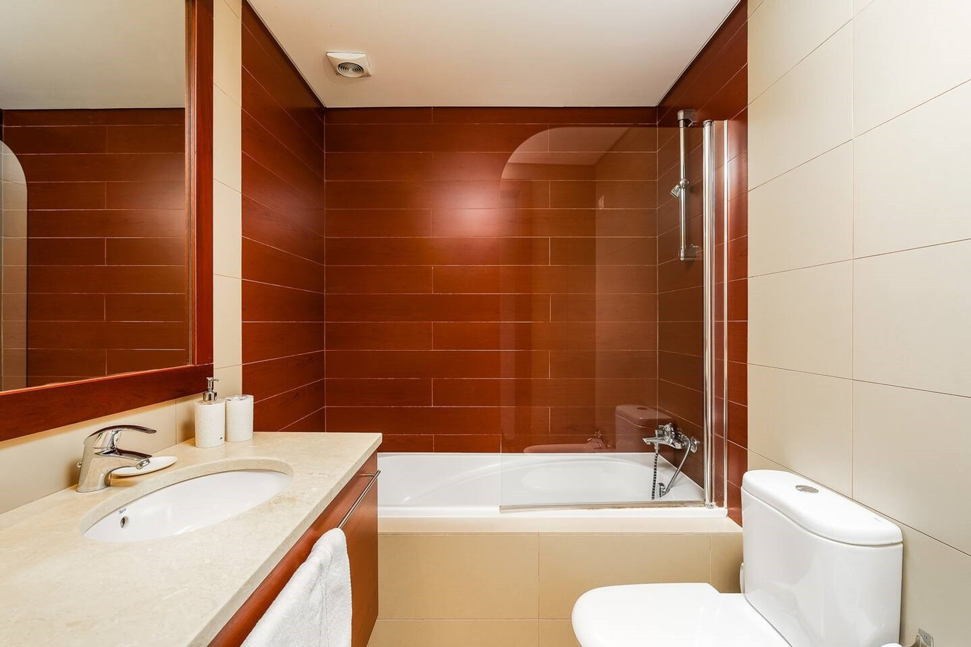 Bathroom with bathtub and shower