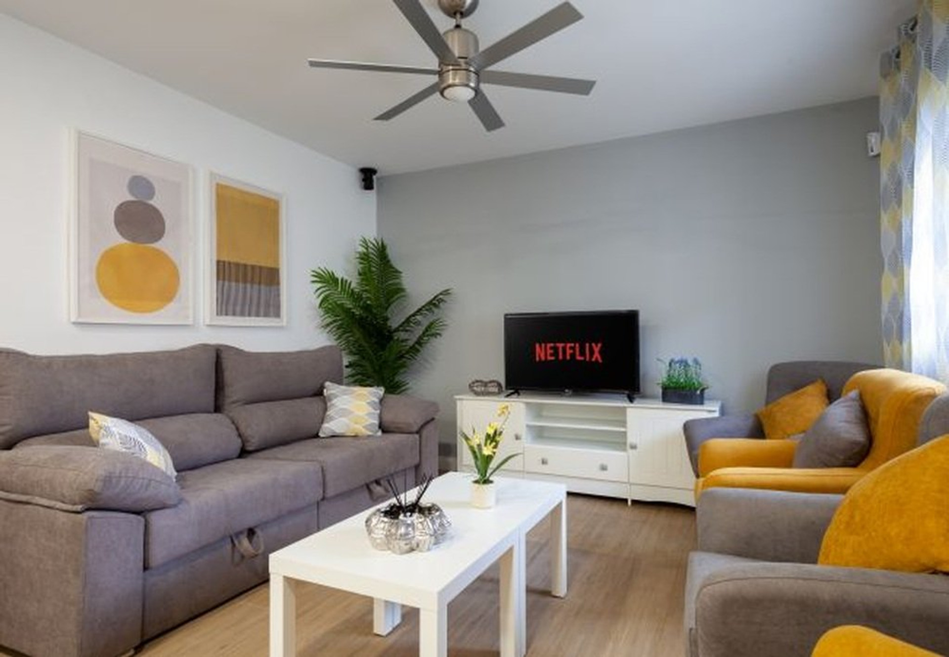 Living room with colorful armchairs