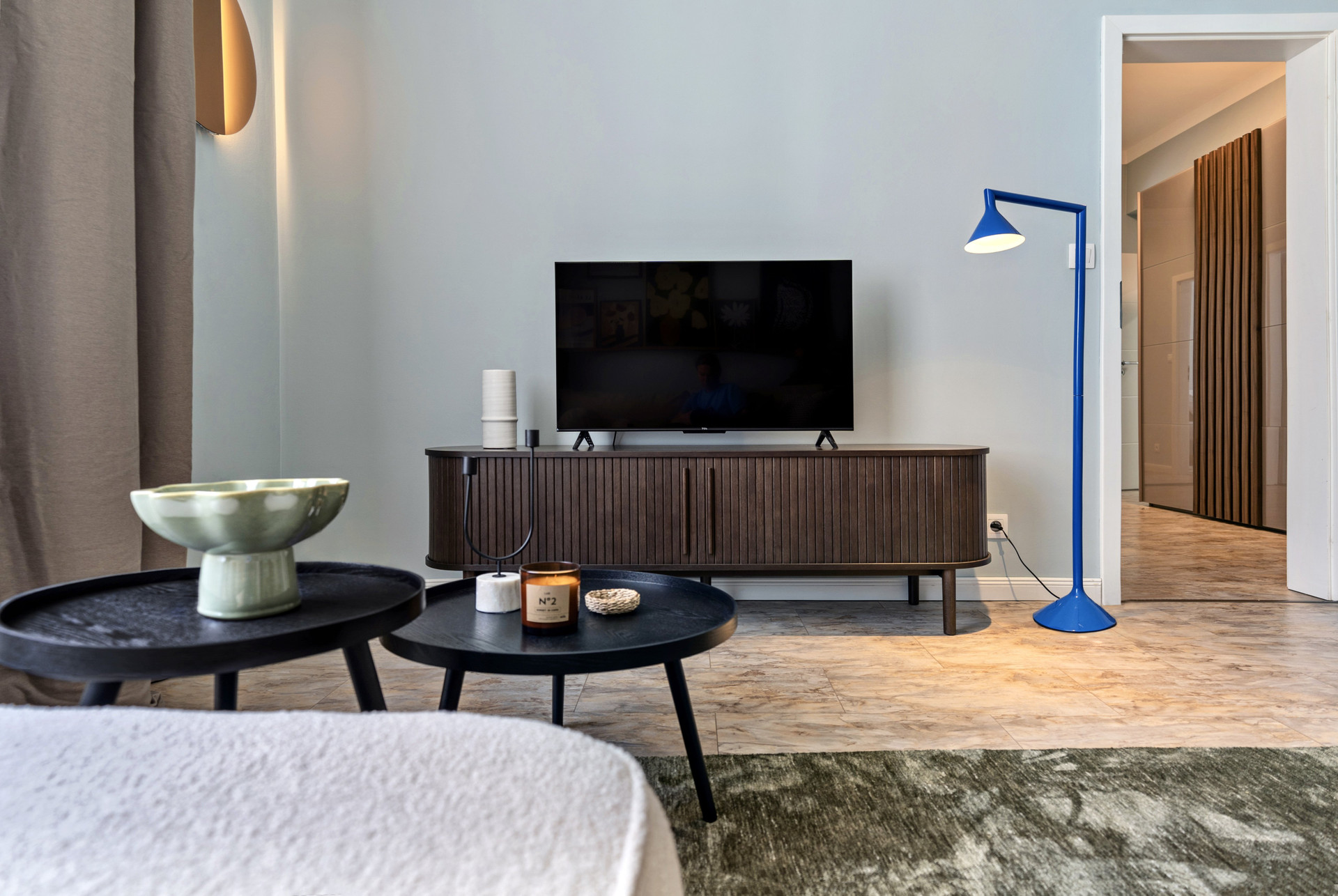 Living room TV and floor lamp