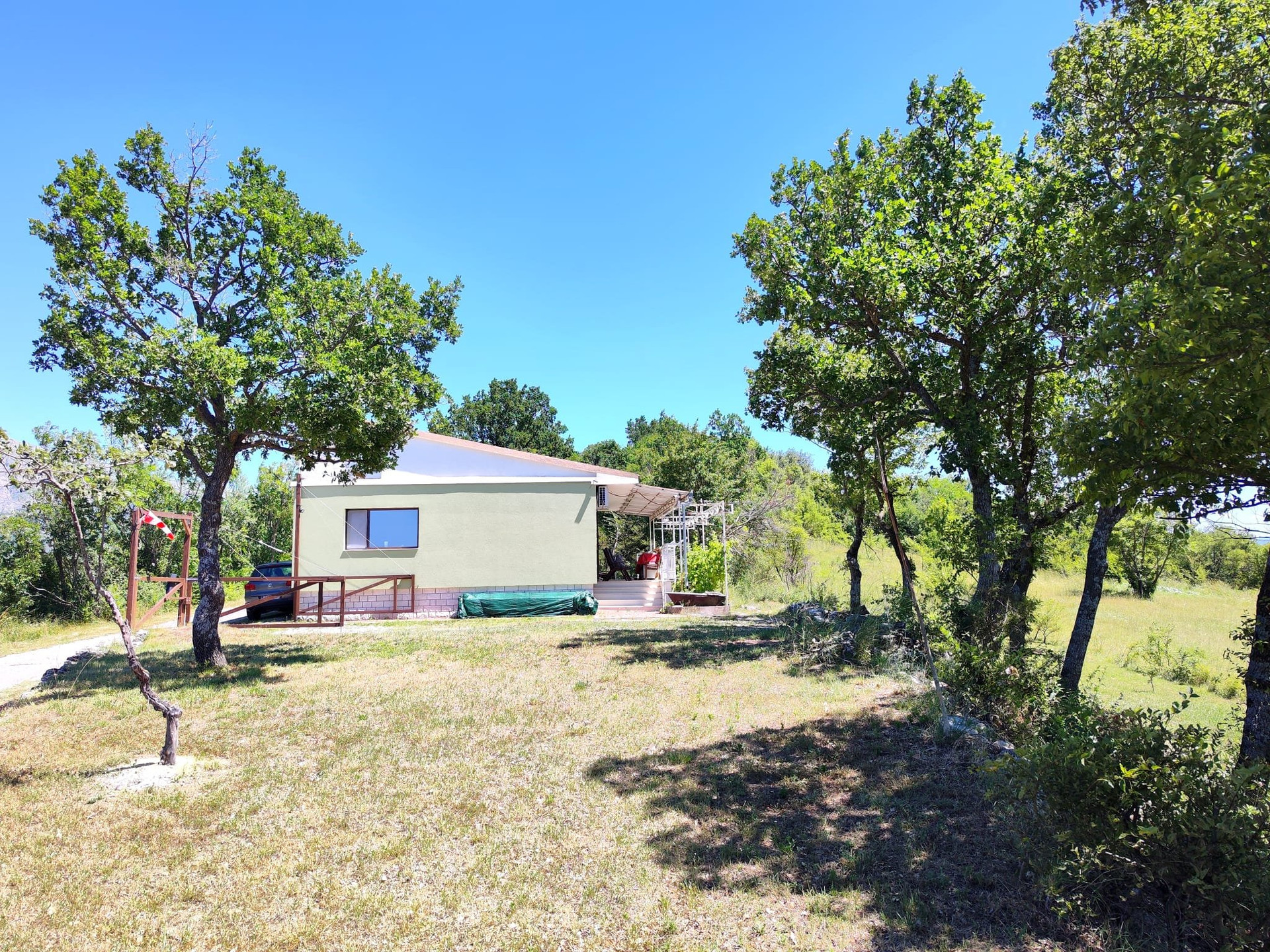 House exterior surrounded by trees