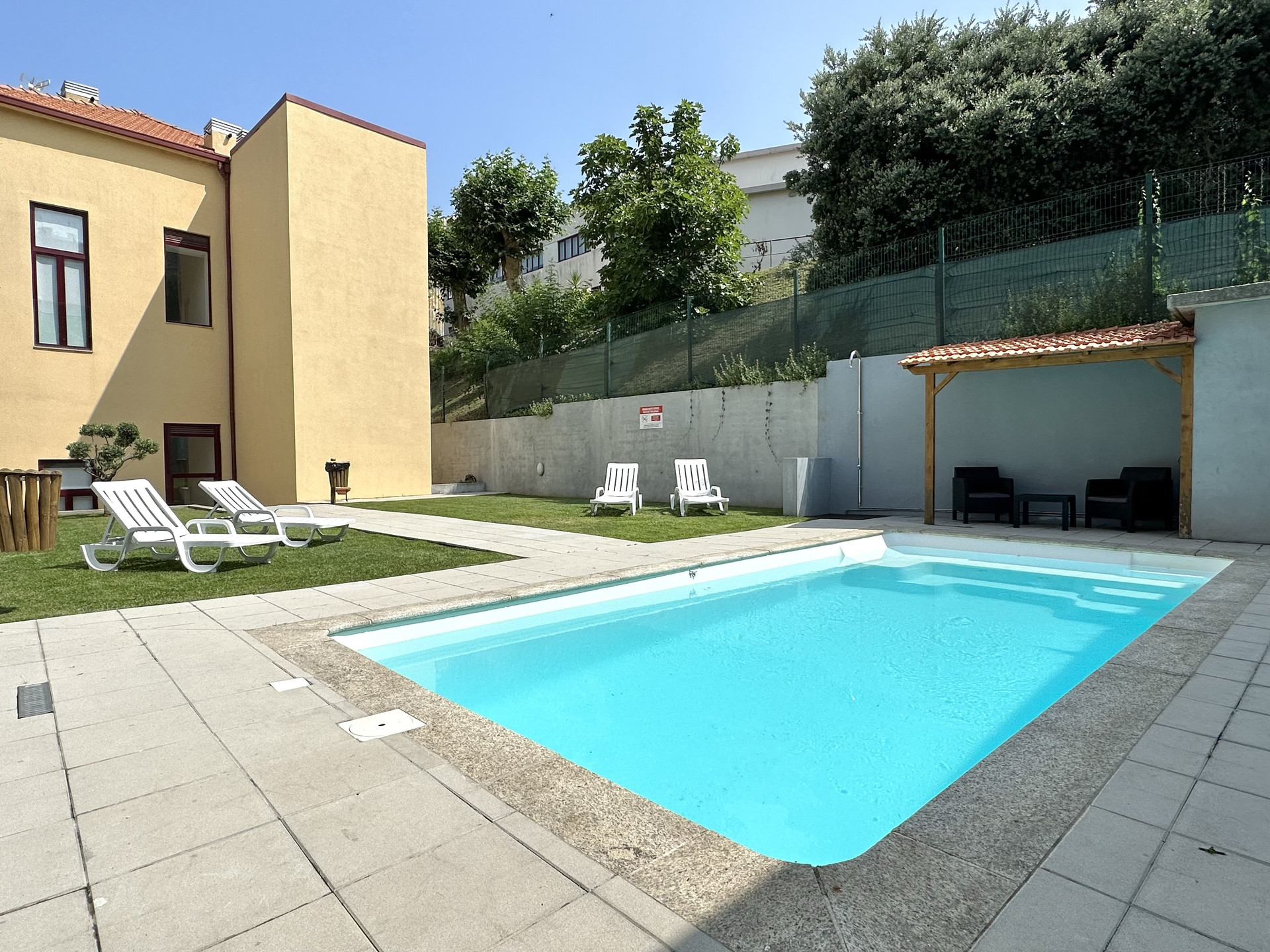 Poolside terrace with loungers