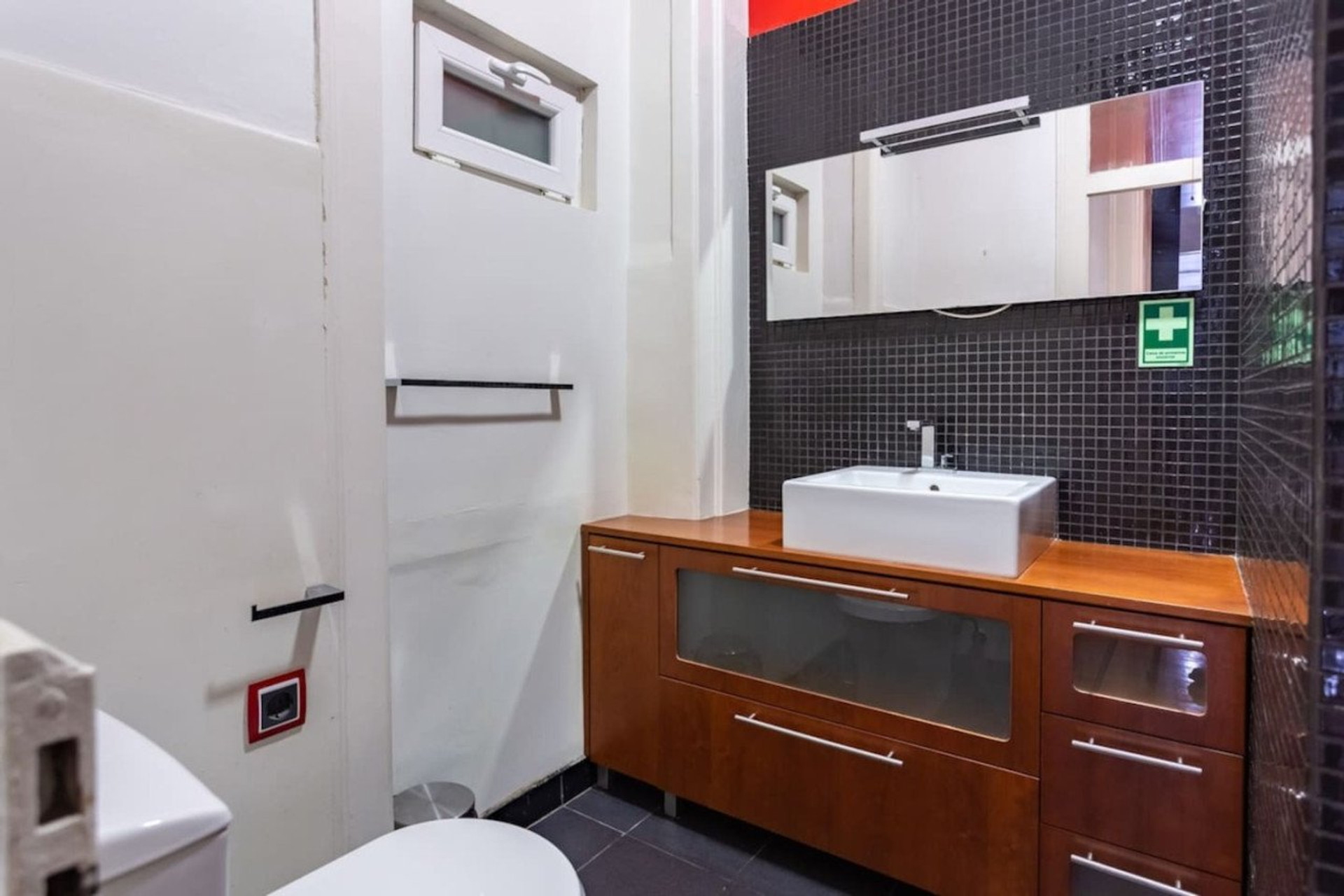 Modern bathroom with wood vanity