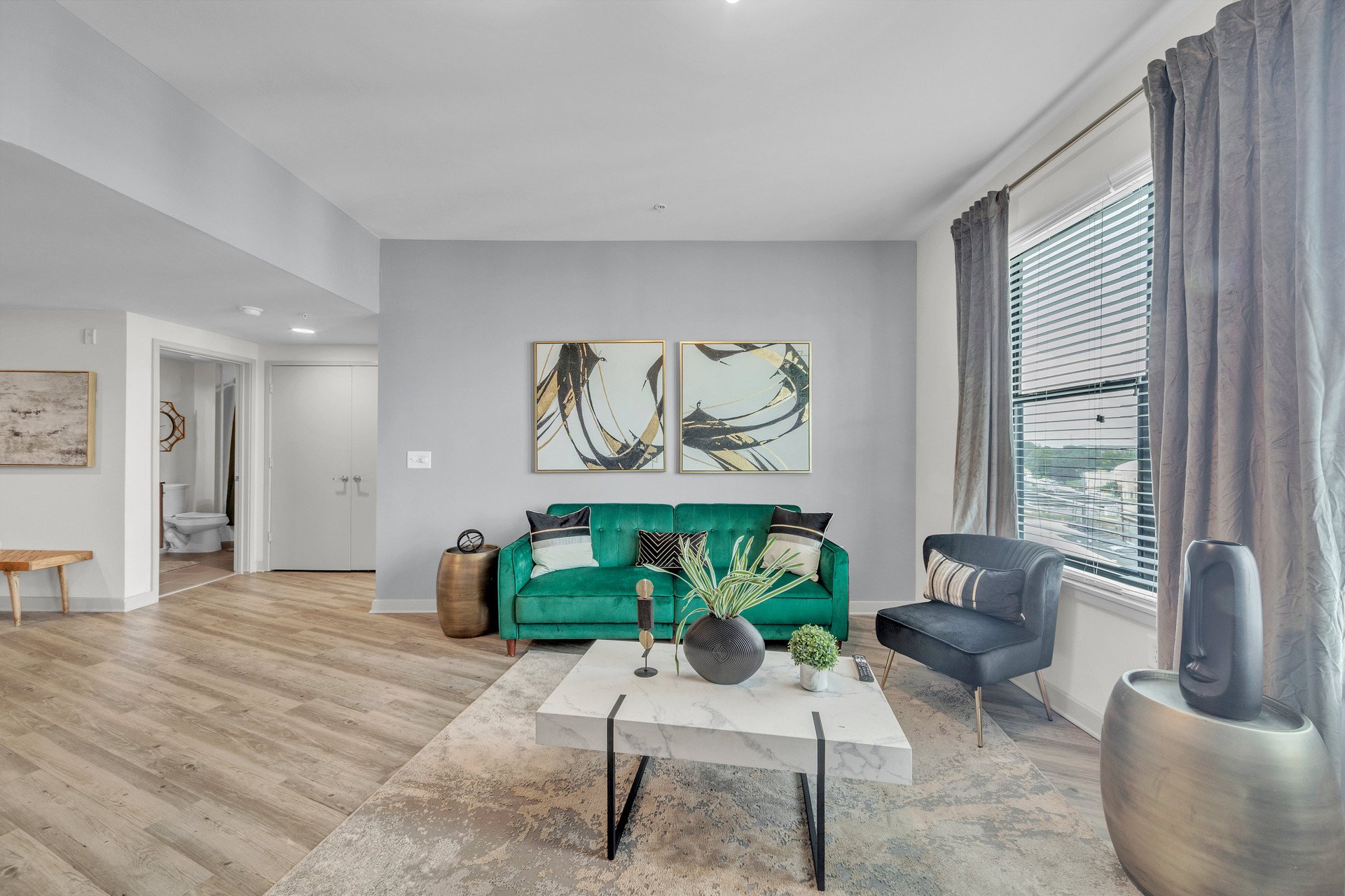Living room with green sofa