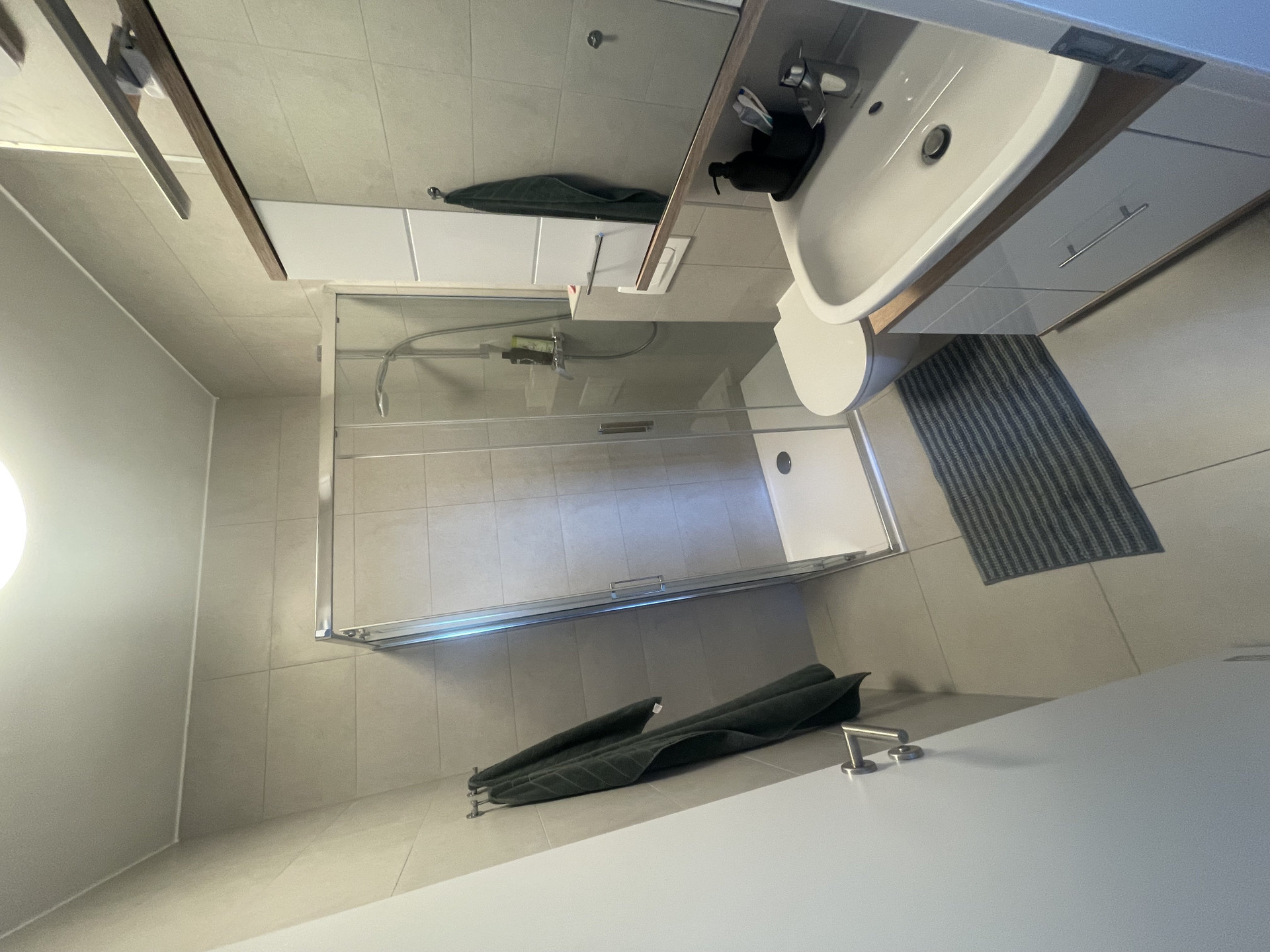Bathroom with shower and vanity