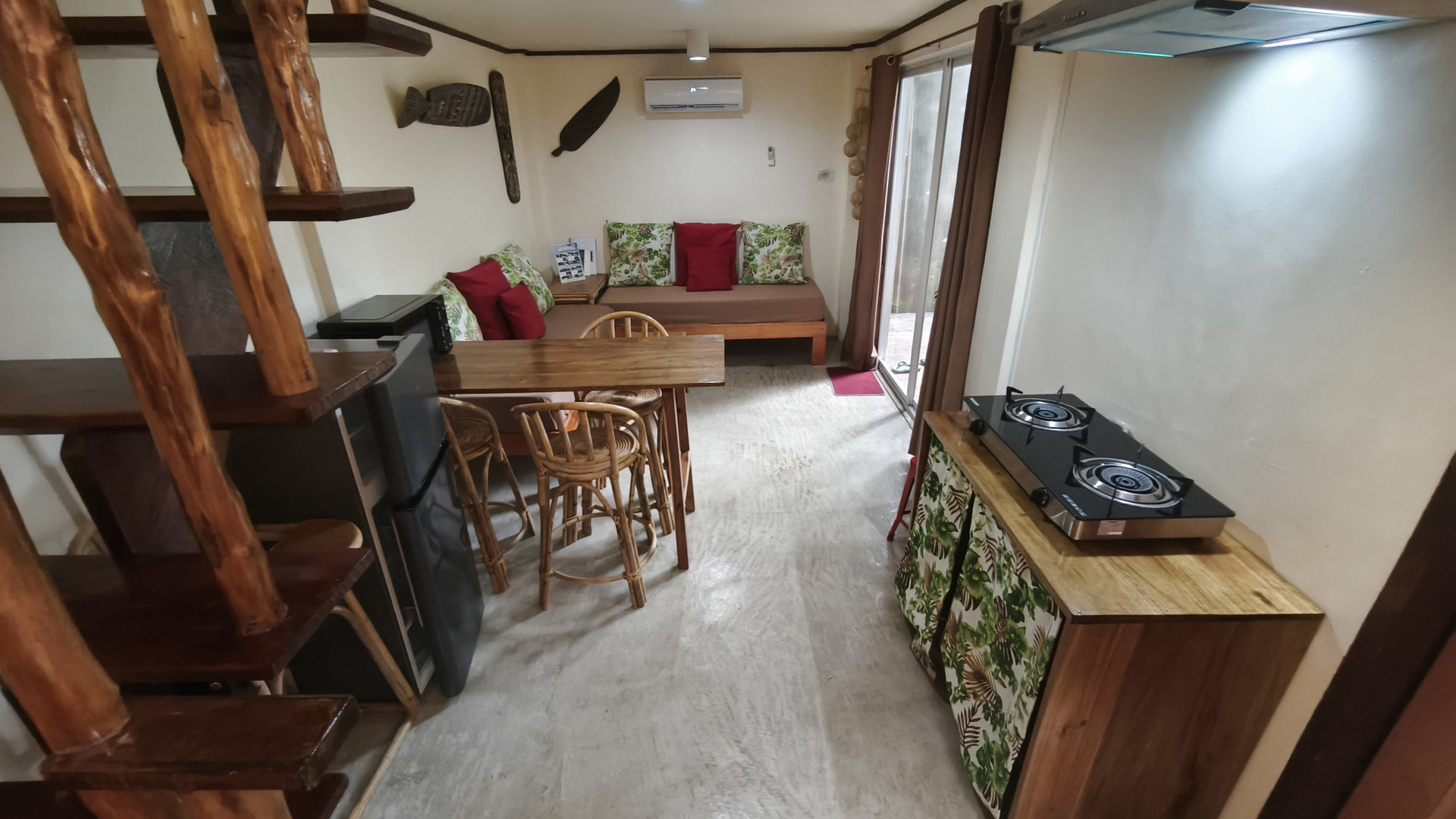 Living area with sofa and stove