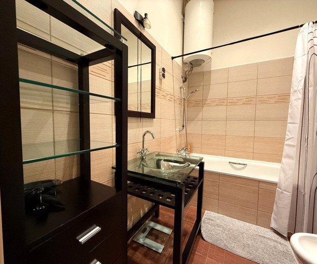 Bathroom with glass sink