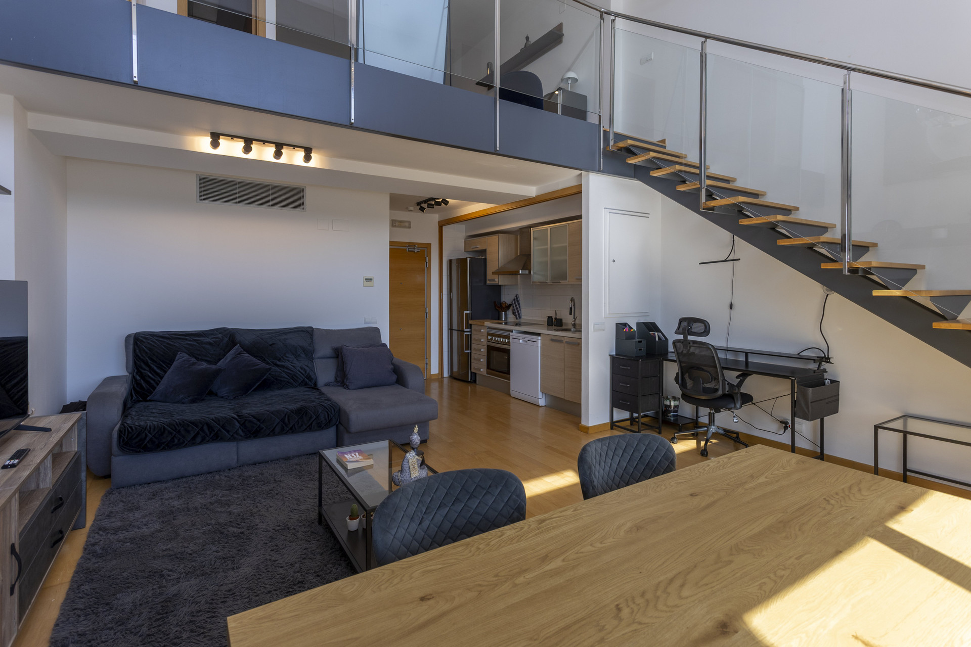 Living room kitchen staircase overview