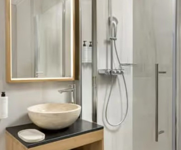 Bathroom with vessel sink and shower