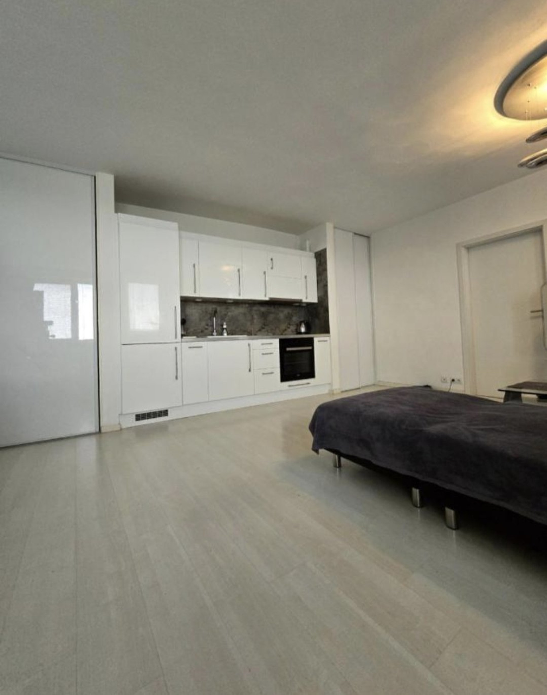 Open plan living area with kitchen