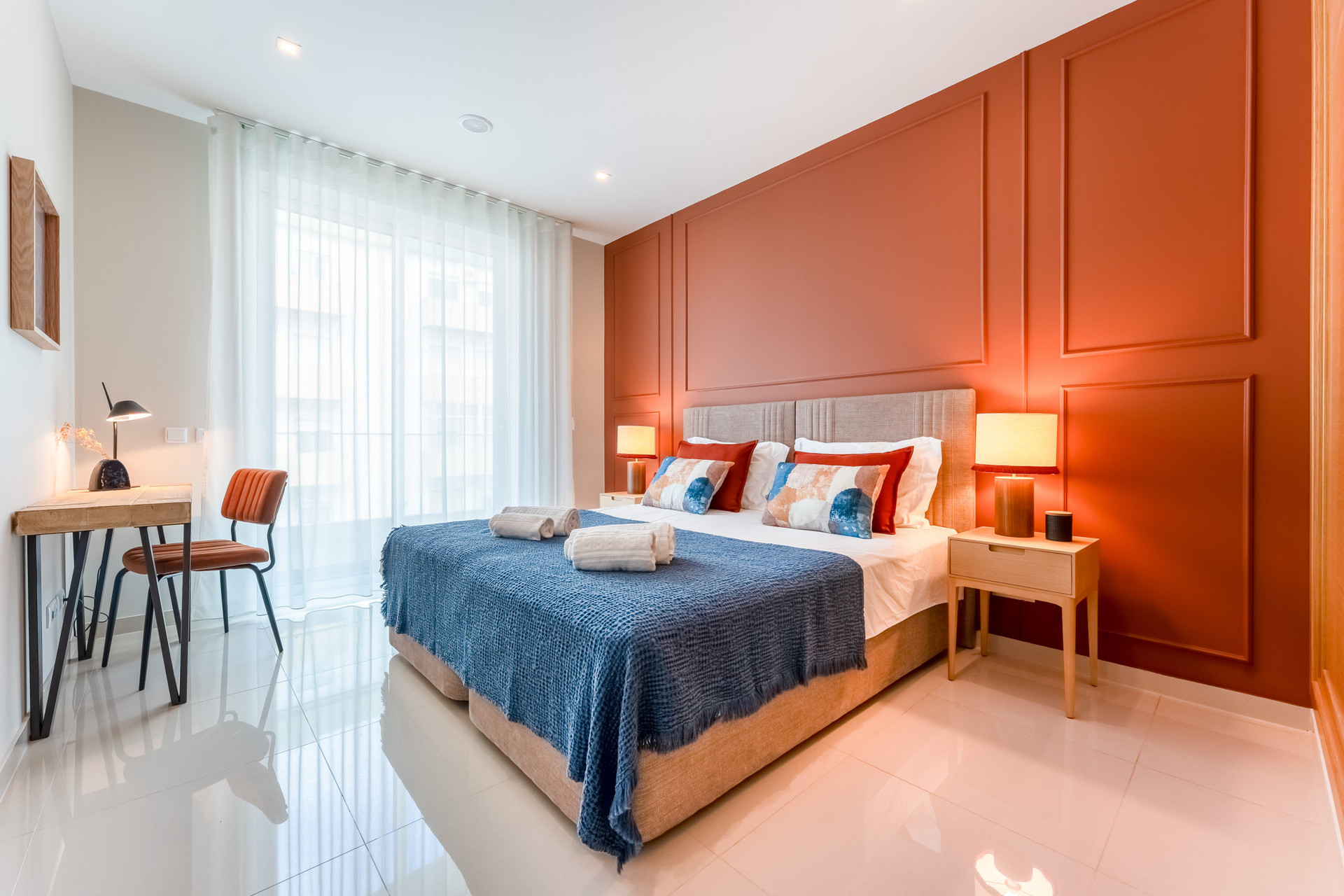 Orange accent wall bedroom