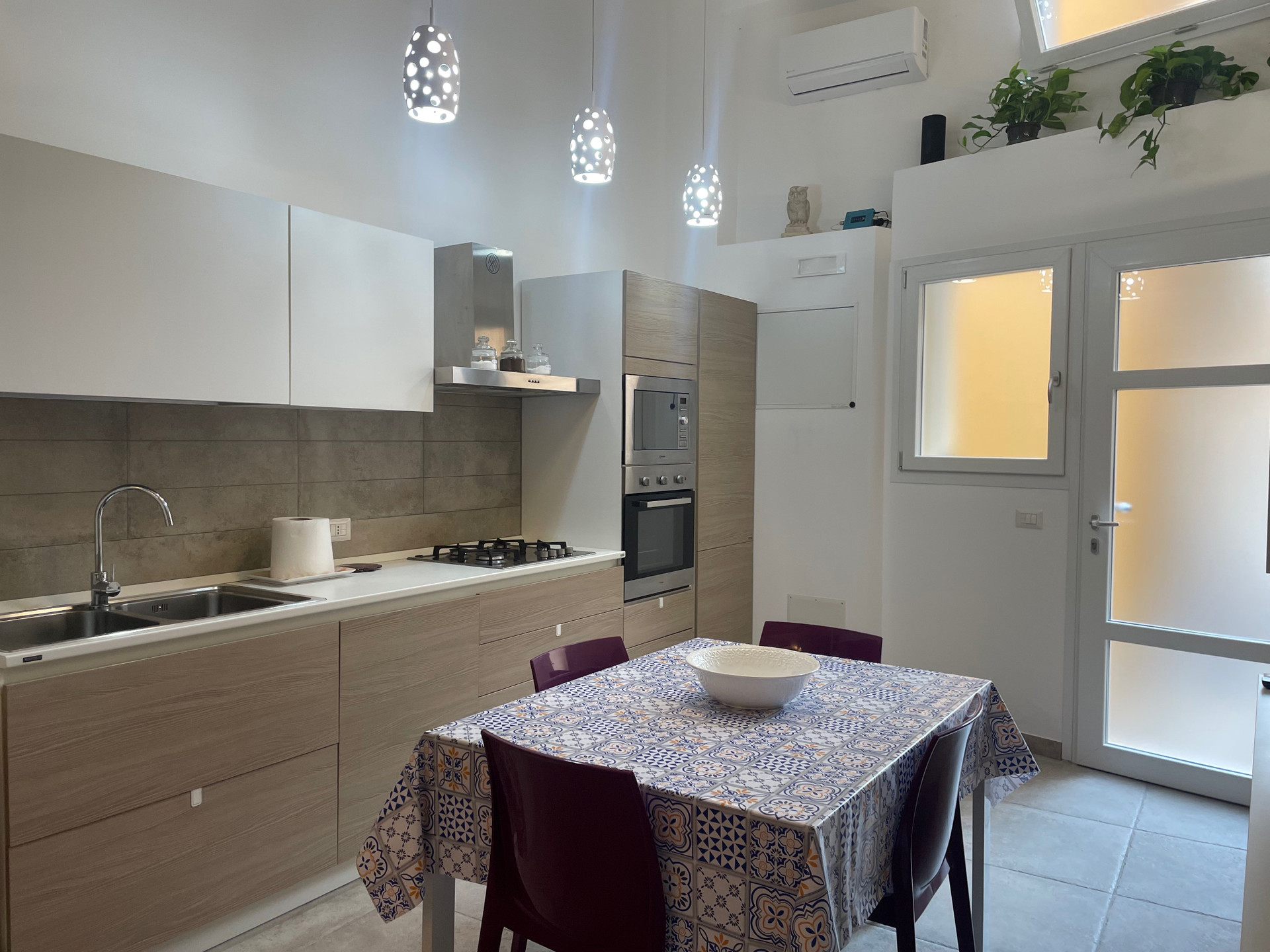 Modern kitchen with dining table