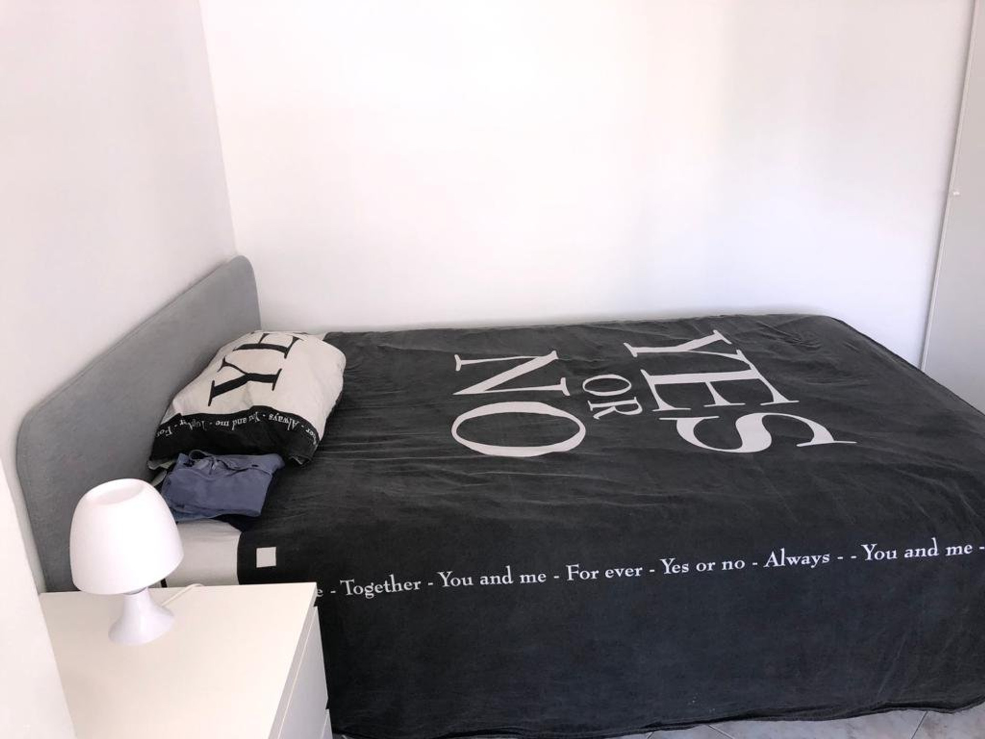 Bed close-up with lamp