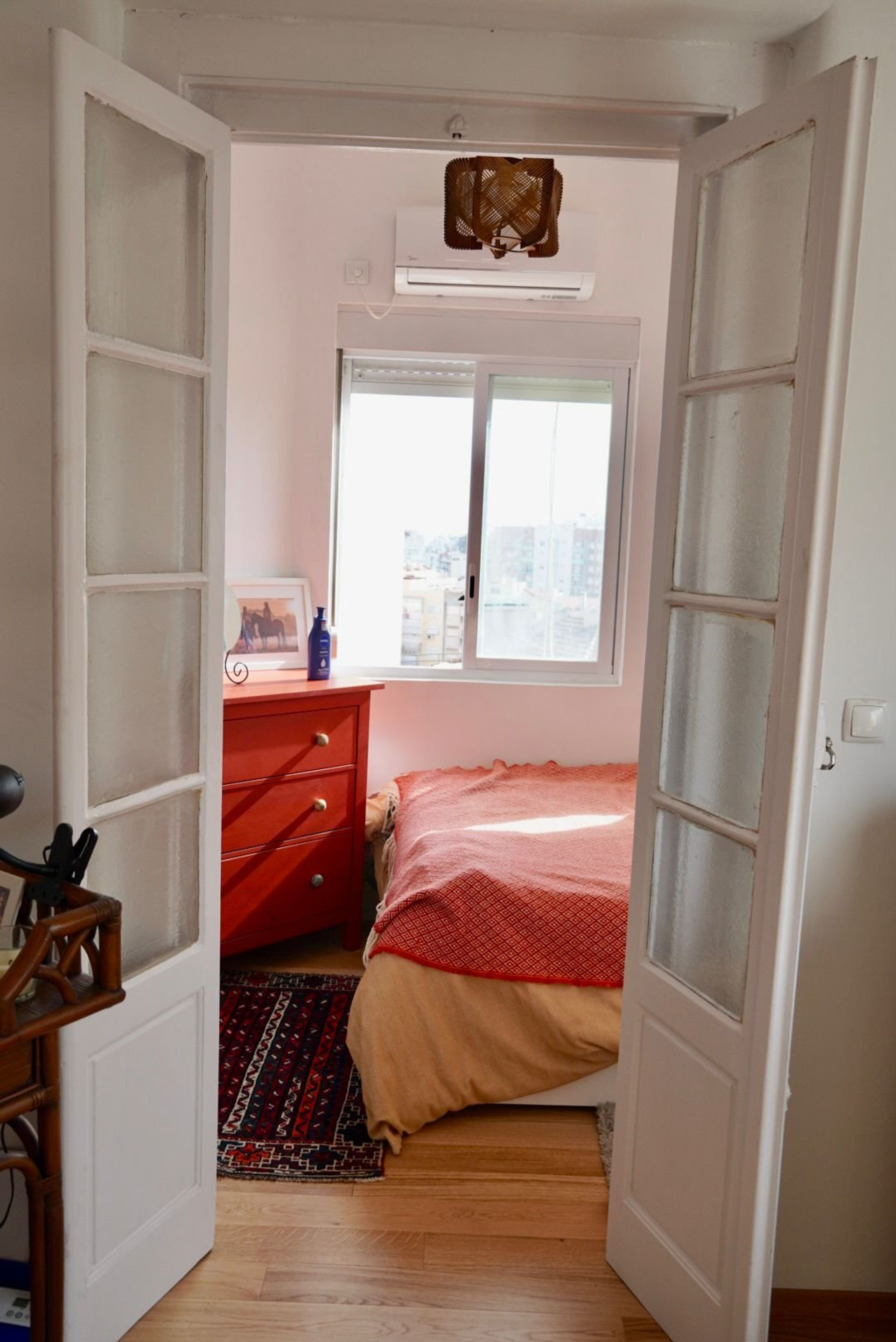 Bedroom with bed and dresser
