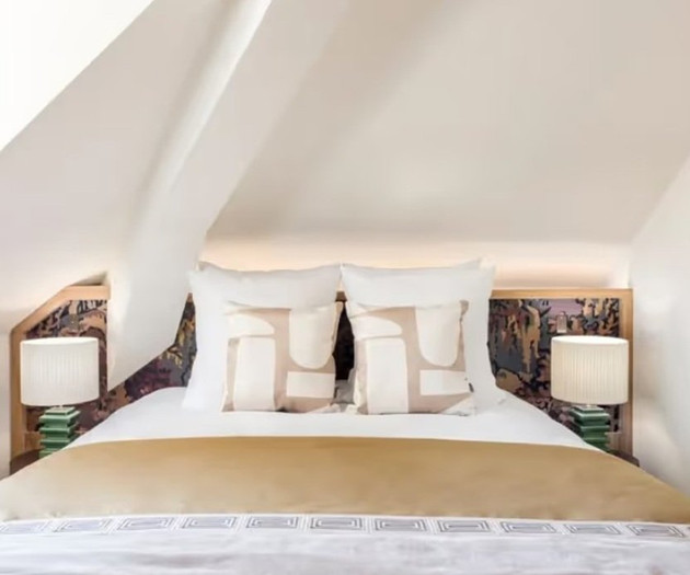 Attic bedroom with sloped ceiling