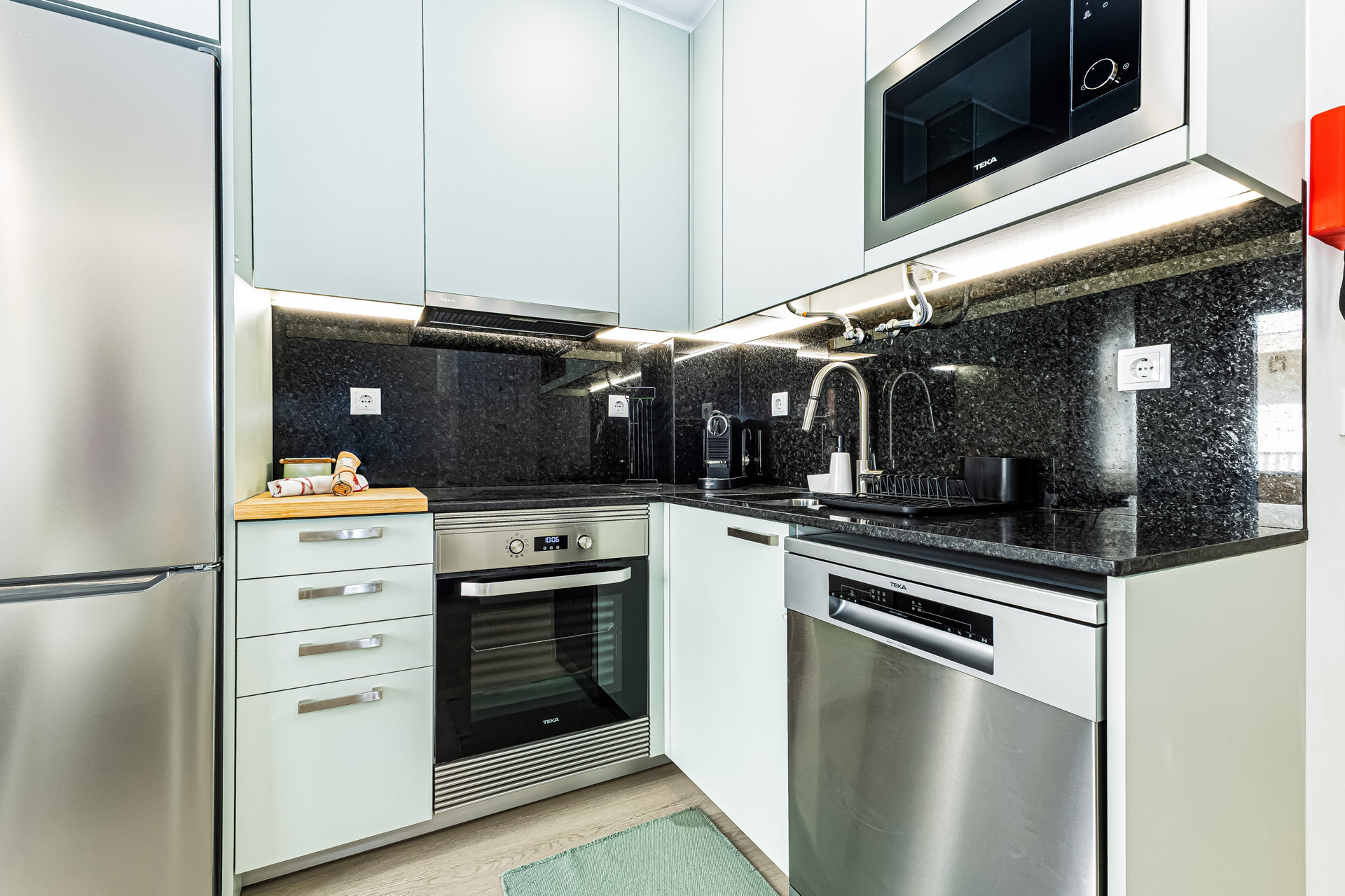 Kitchen with granite backsplash